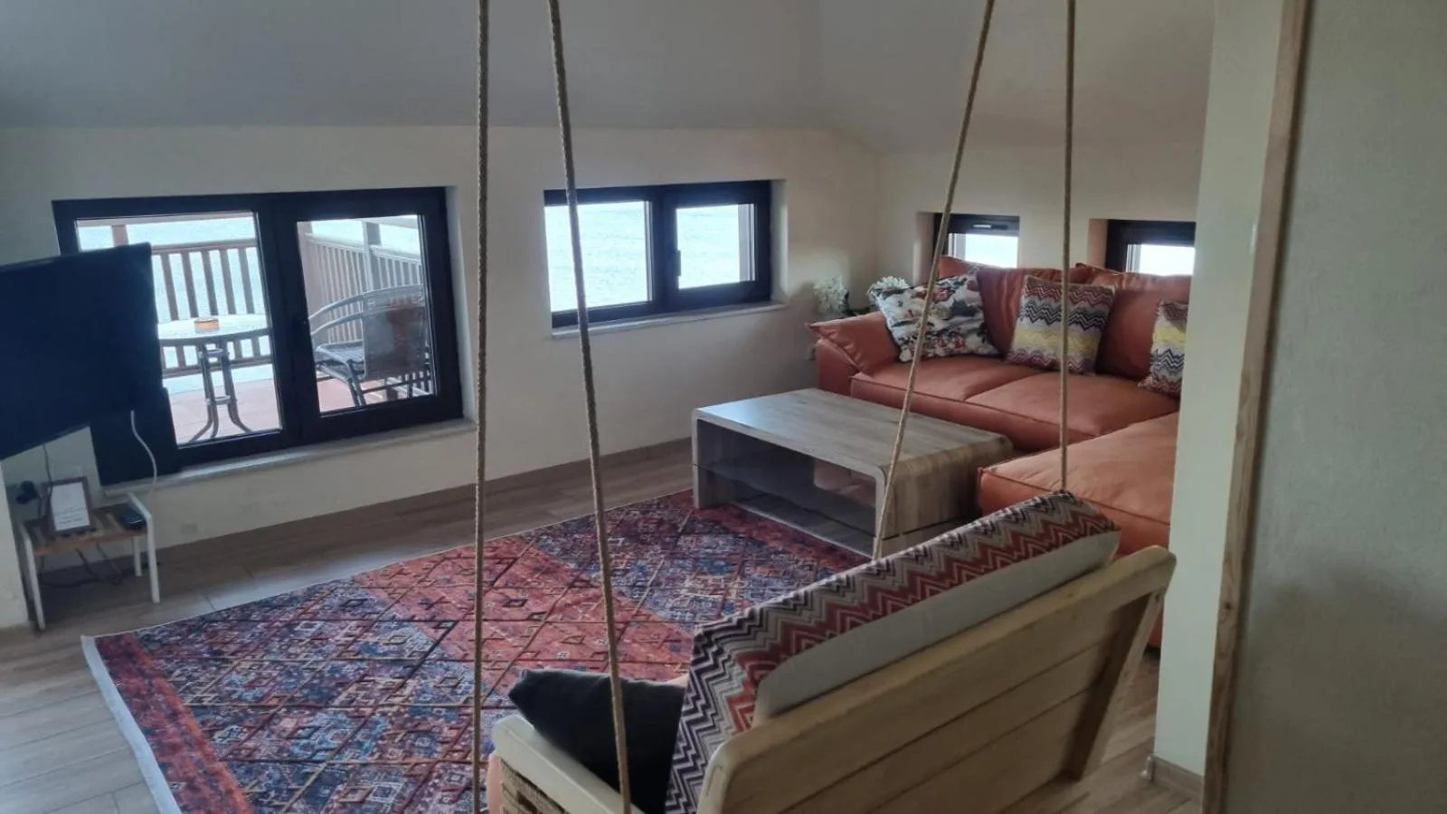 Communal lounge/ TV room in Villa Elea