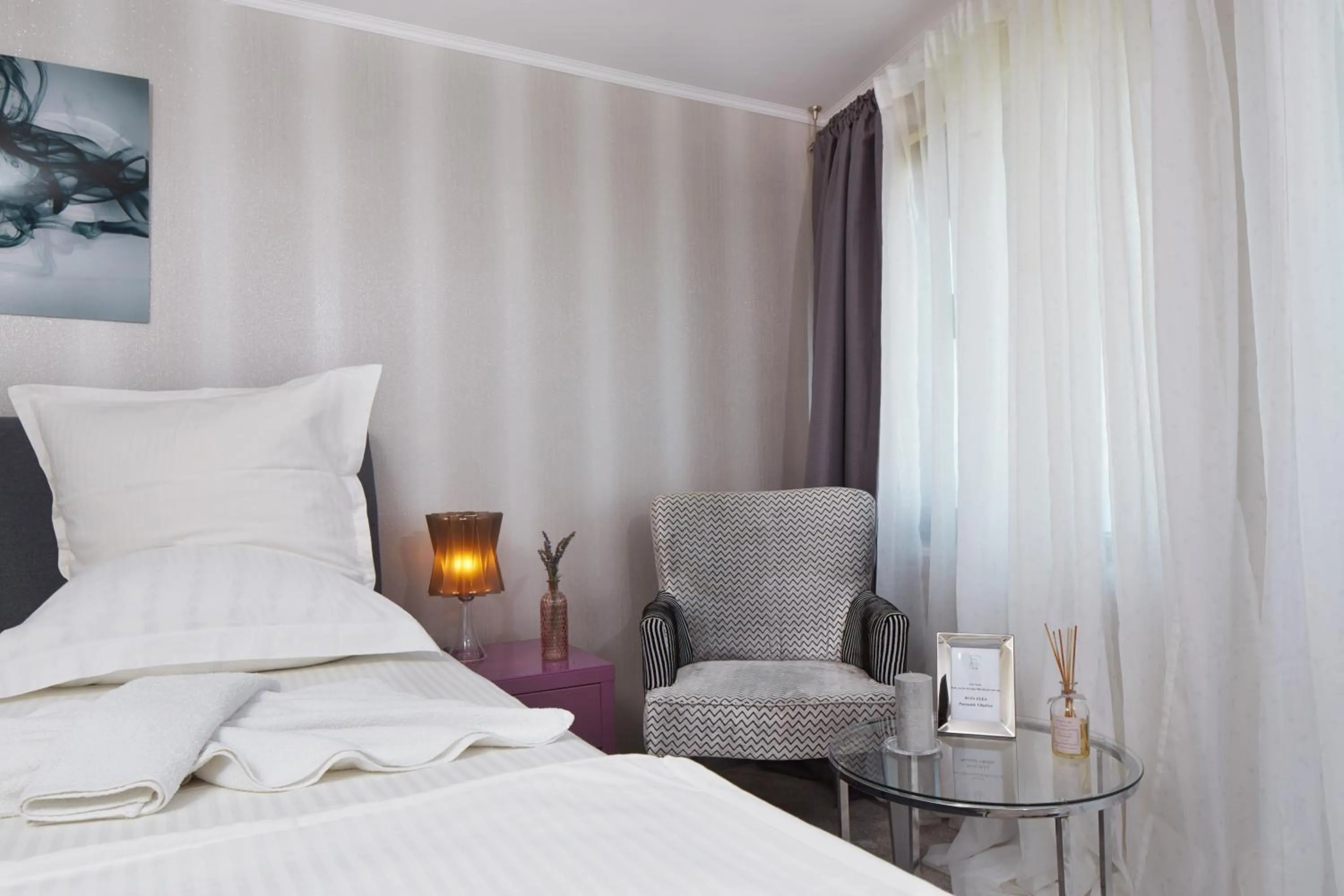 Seating area, Bed in Villa Elea