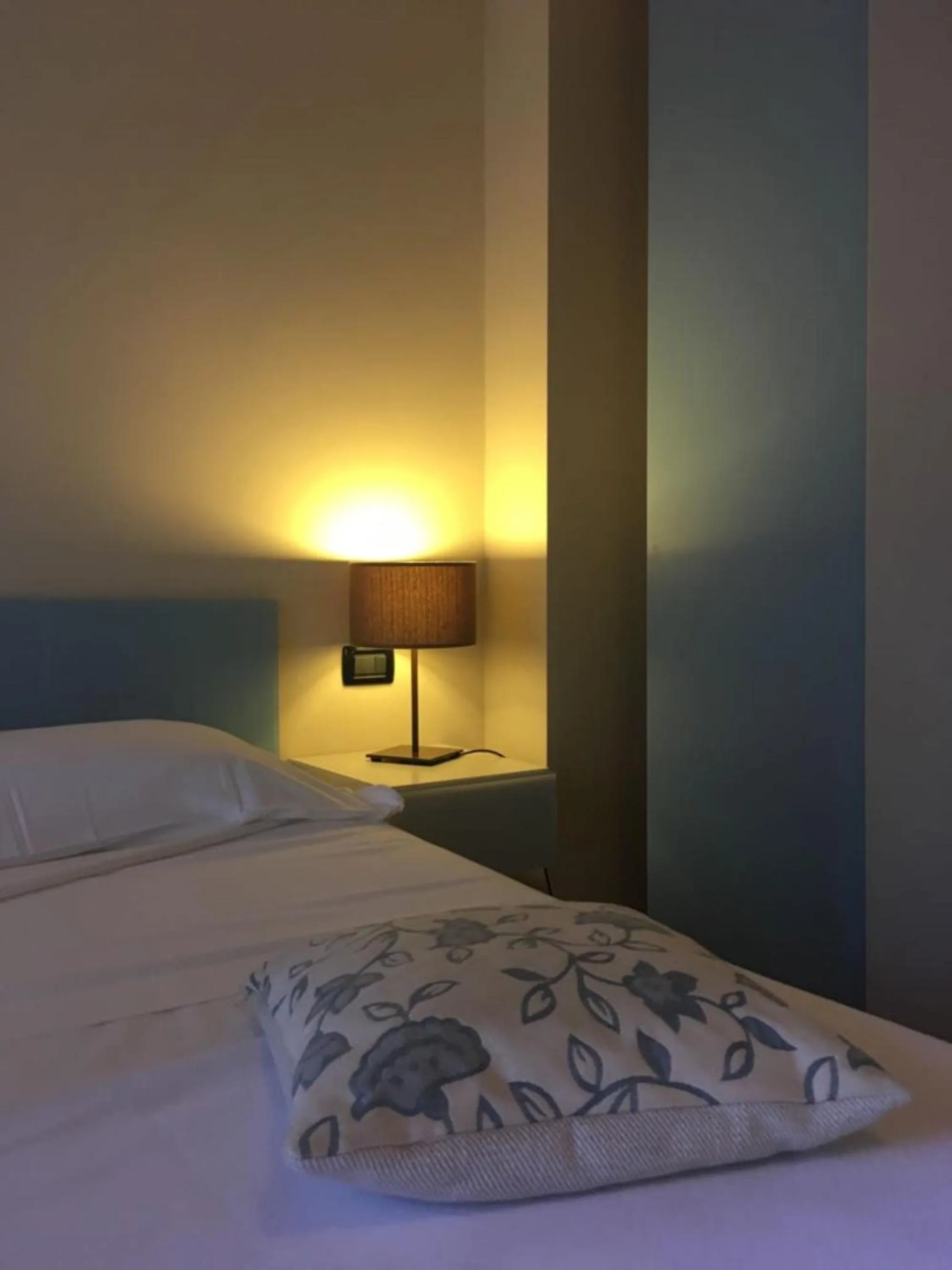 Bed in Corte San Luca Apartments