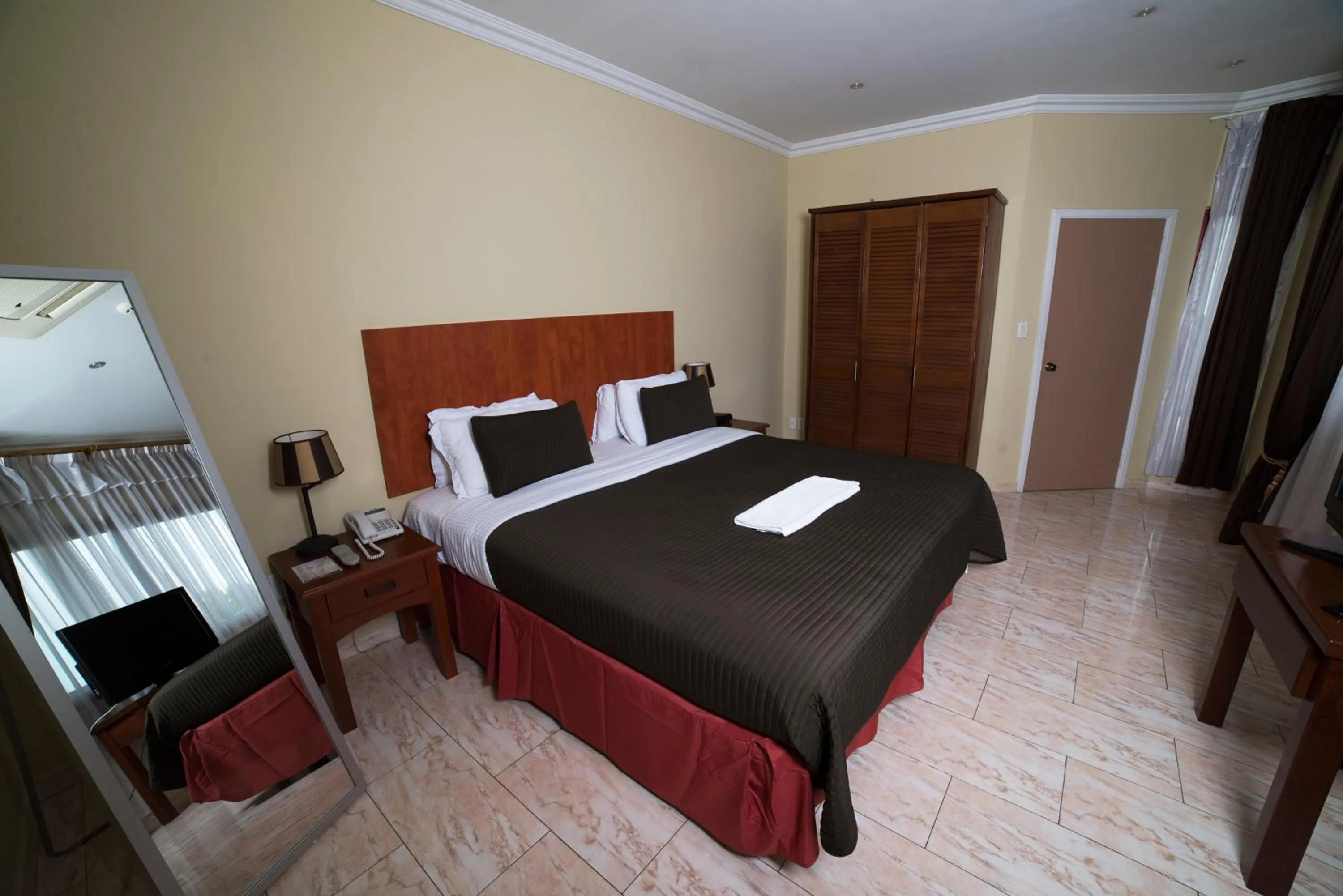 Bedroom in Hotel Elegance NV