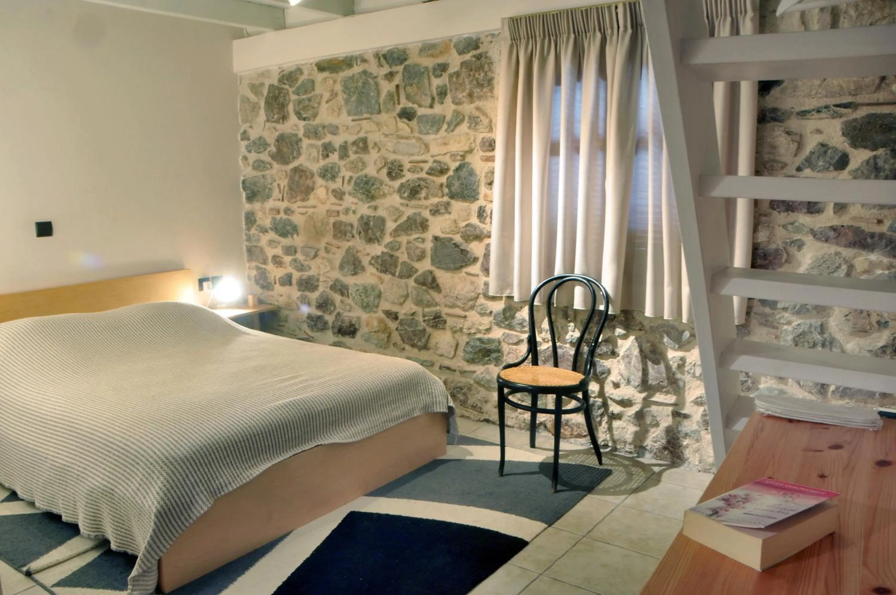 Bed in Limni Stone Apartments