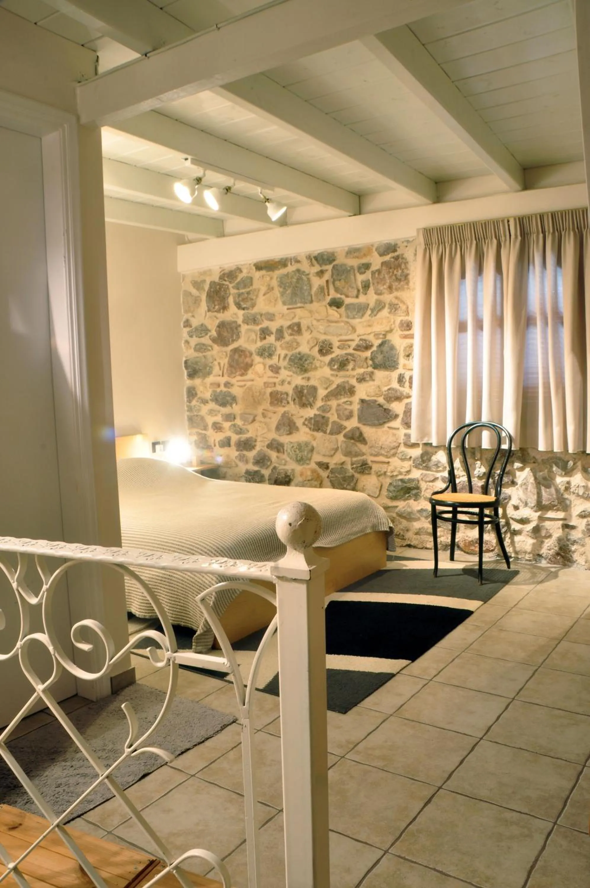 Bed in Limni Stone Apartments