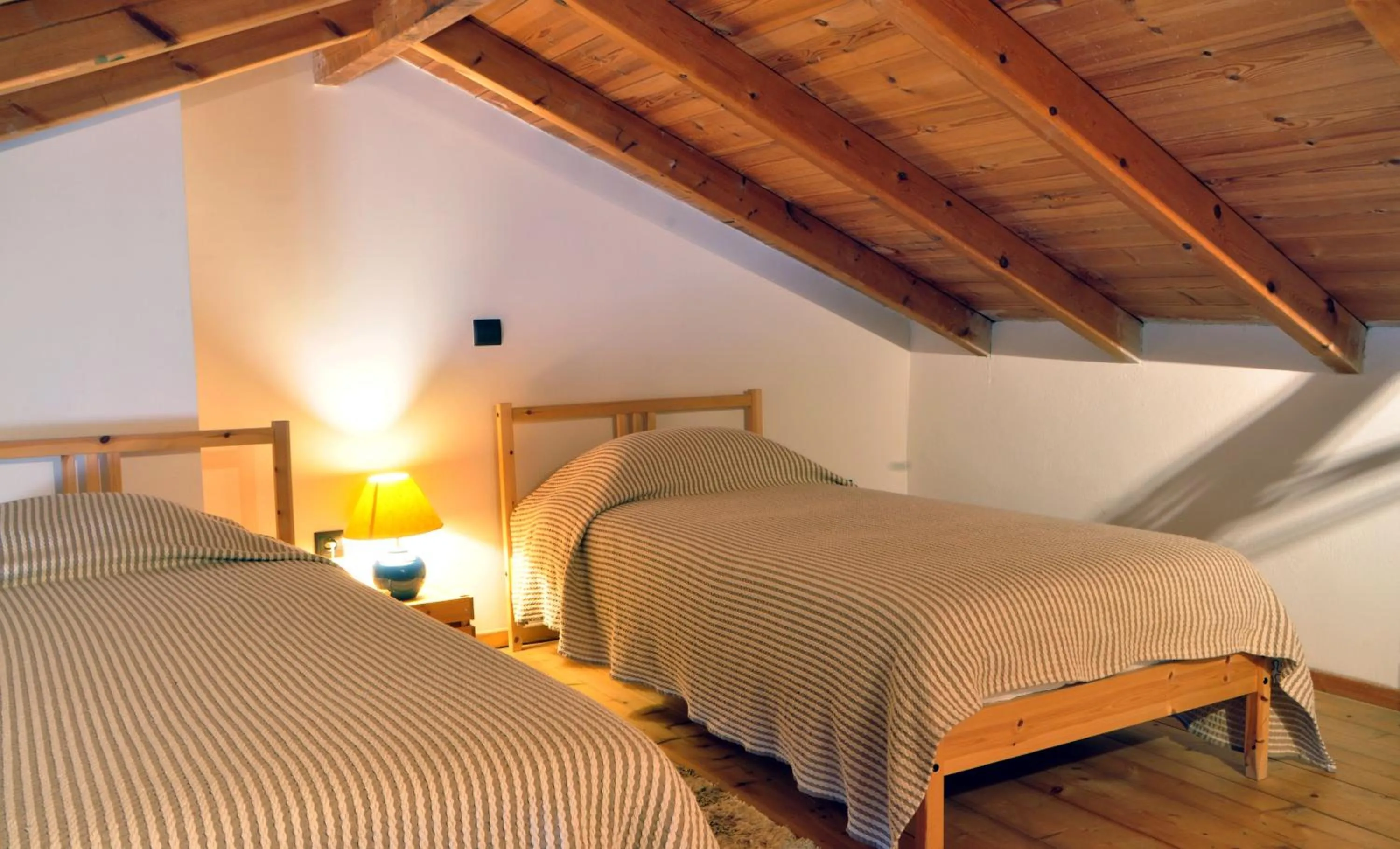 Bed in Limni Stone Apartments