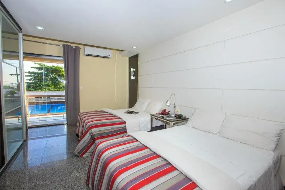 Deluxe Triple Room - single occupancy in Da Vinci Hotel & Conventions - by Easy Hotéis Deluxe Triple Room - single occupancy in Da Vinci Hotel & Conventions - by Easy Hotéis