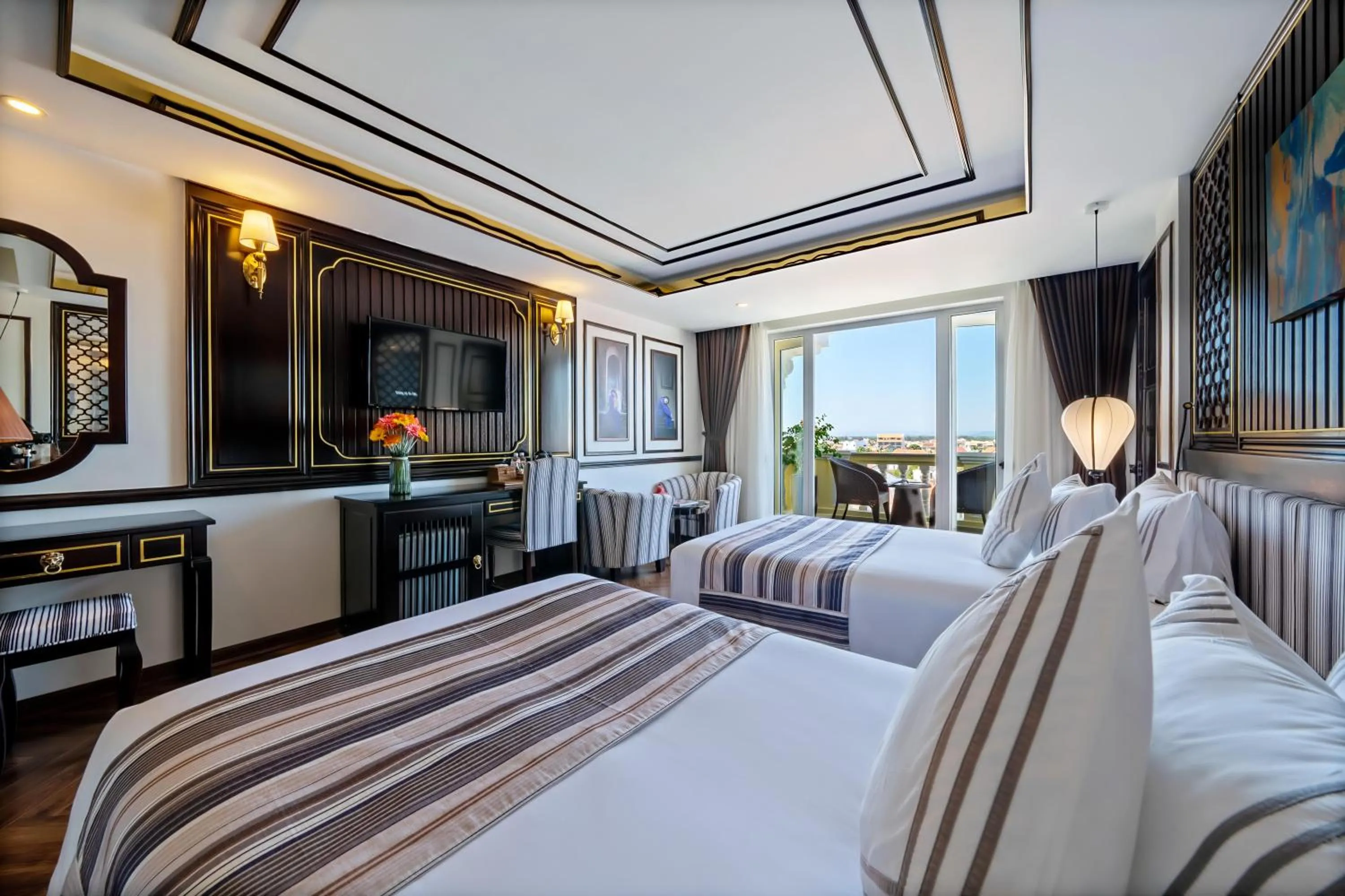 Communal lounge/ TV room, Bed in Le Pavillon Hoi An Luxury Resort & Spa