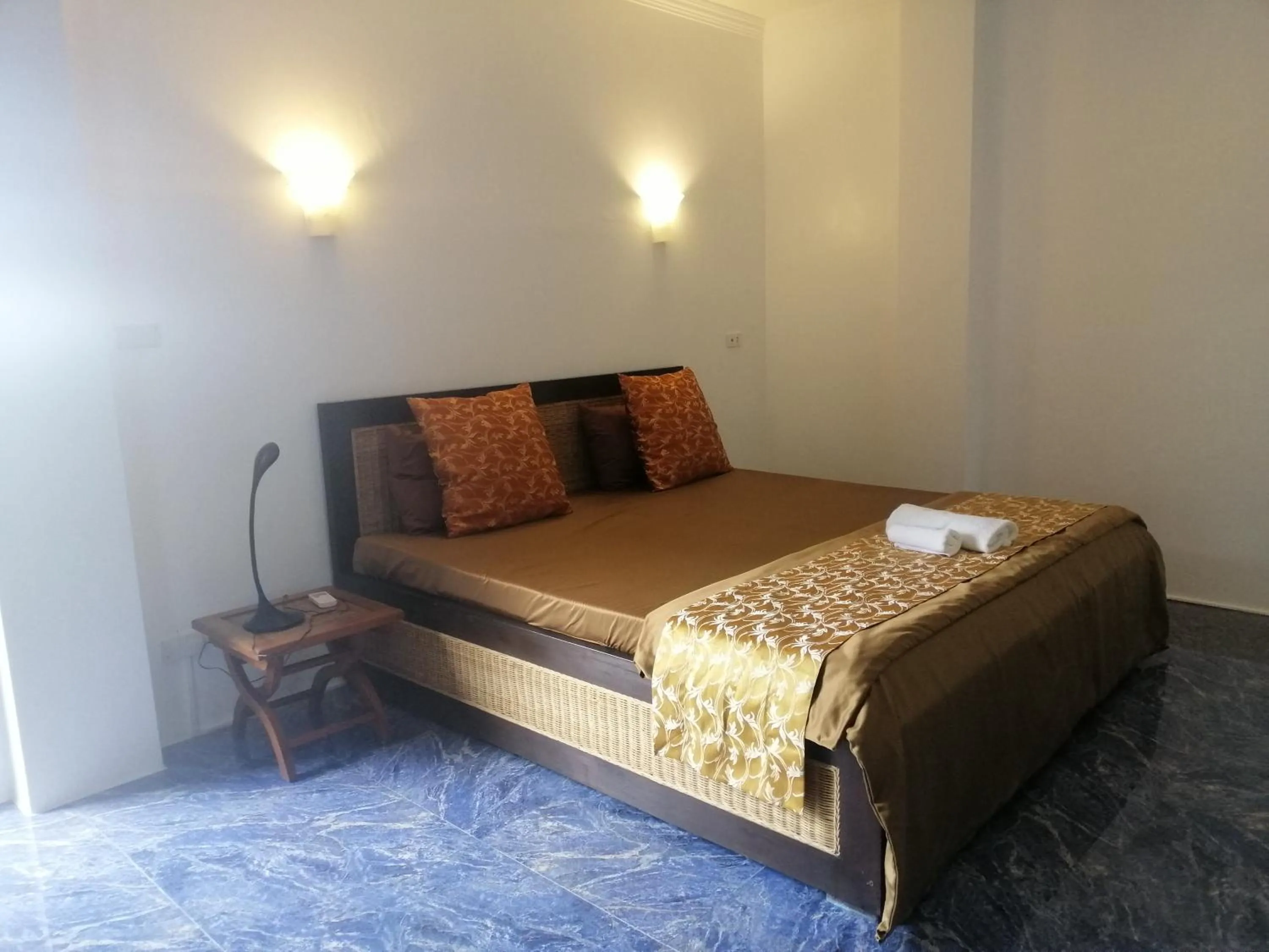 Bed in Panorama de Argao Boutique Resort