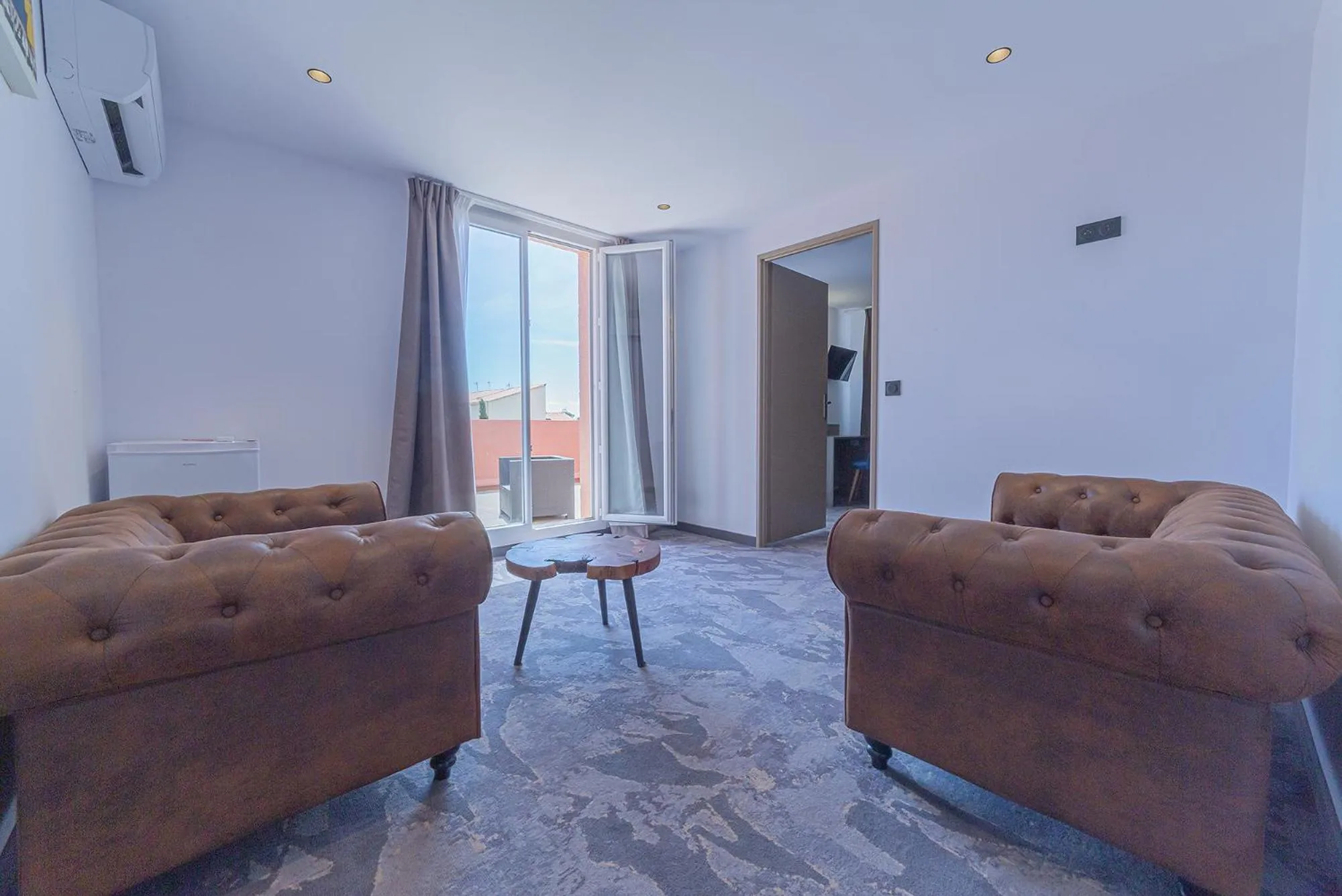 Living room in The Originals City, Relax'Otel & Spa, Le Barcarès