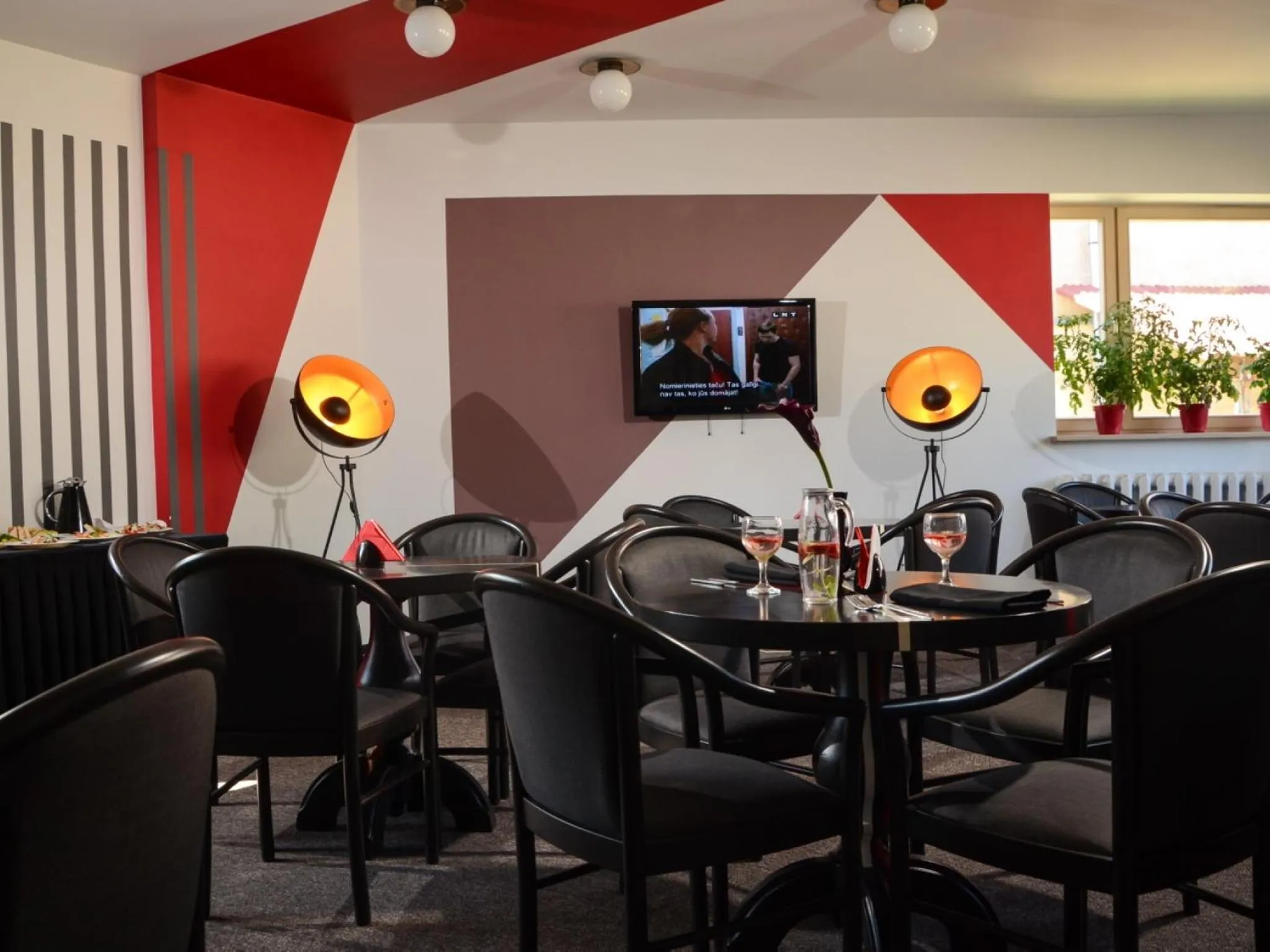 Communal lounge/ TV room in Mans Nams - self check in hotel