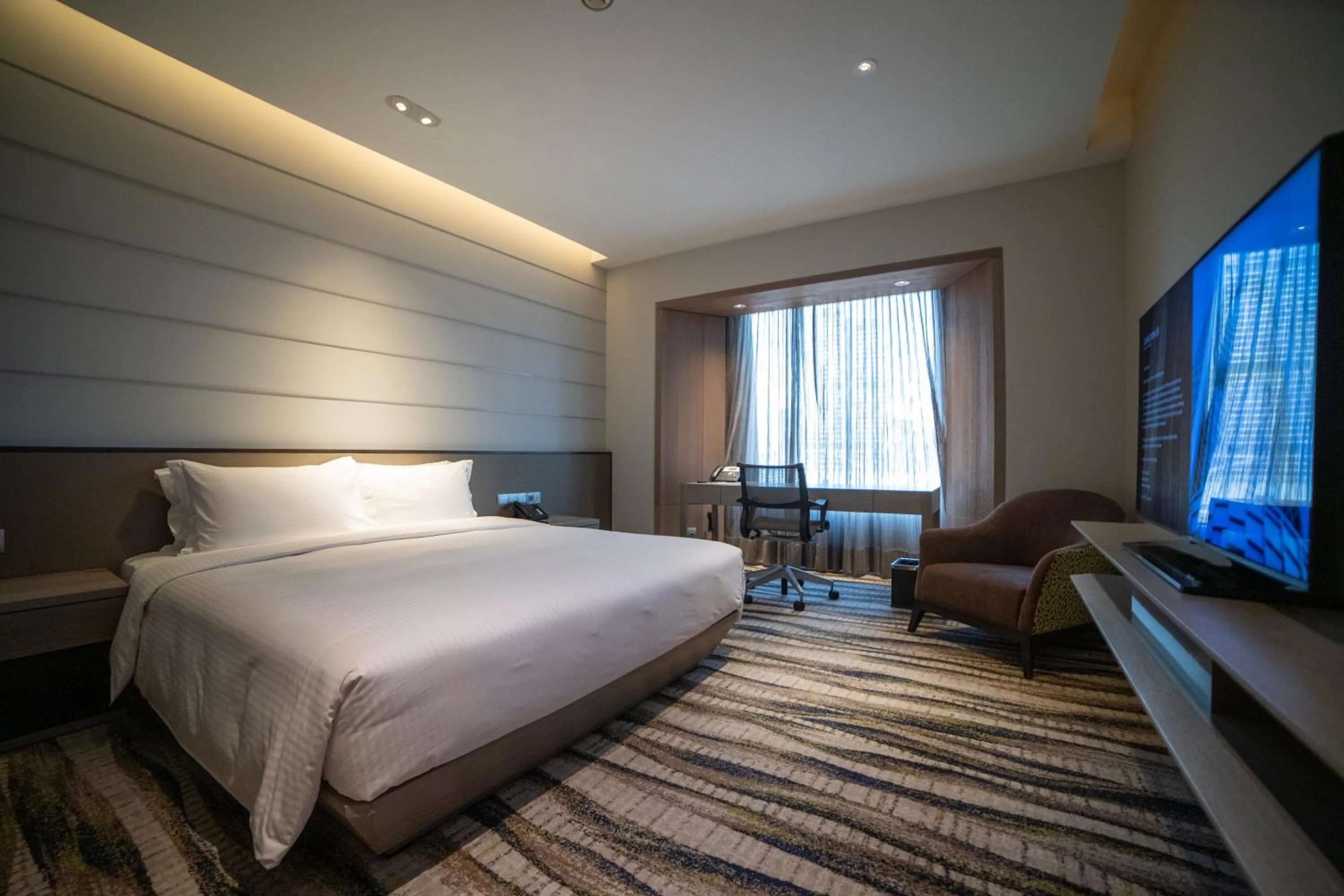 Bedroom, Bed in Carlton Hotel Singapore