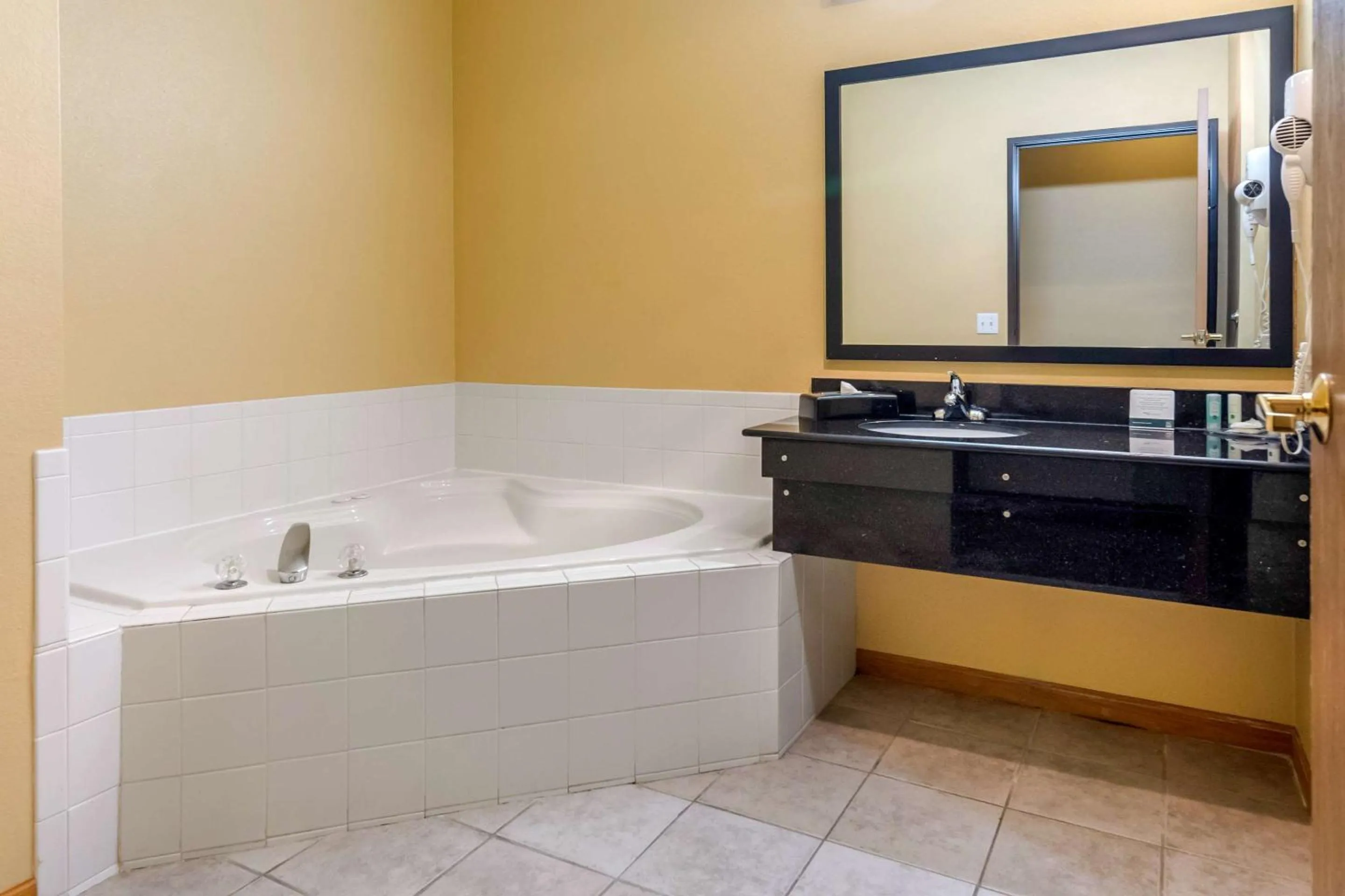 Bedroom in Quality Inn & Suites Lenexa Kansas City