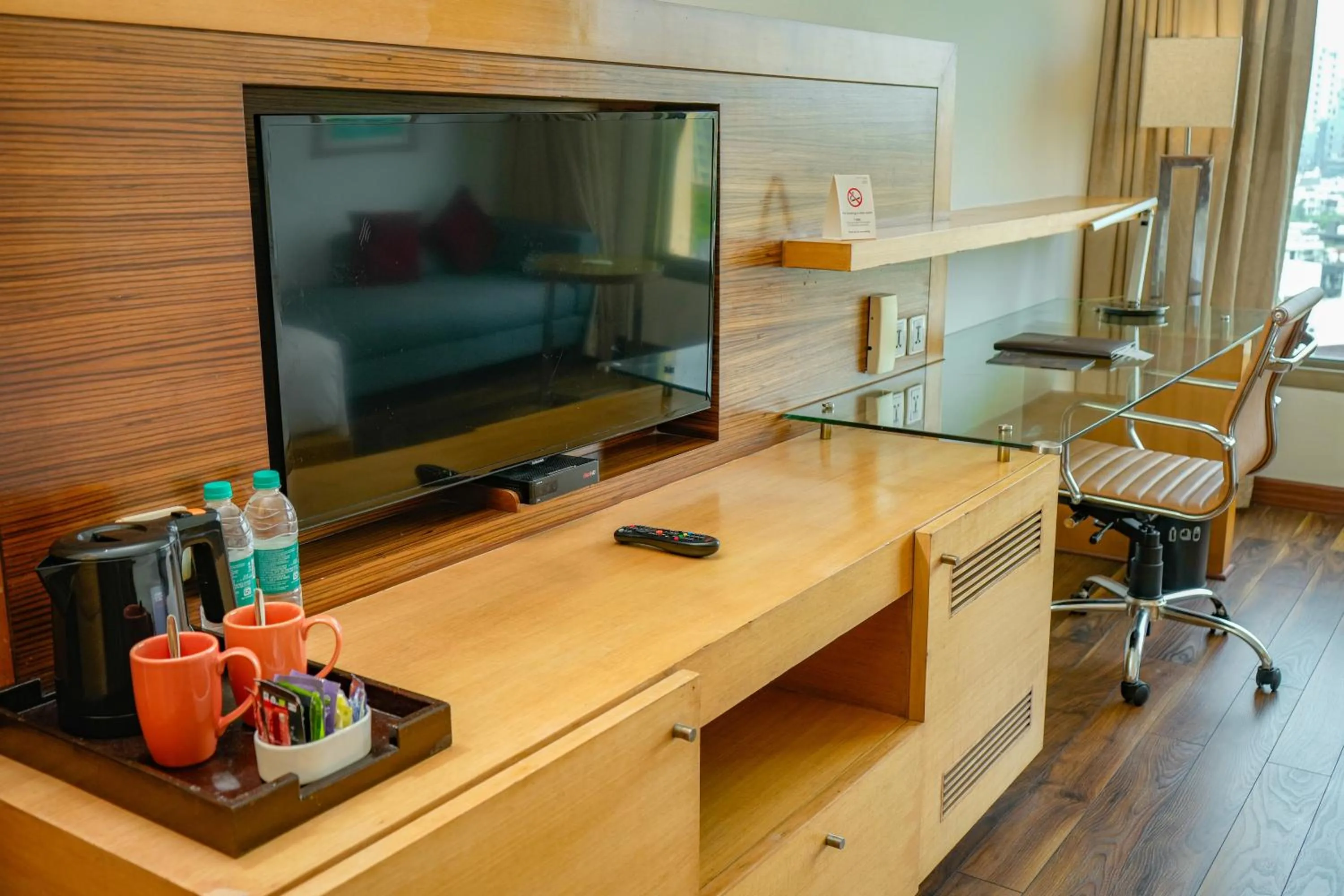 TV and multimedia in Courtyard by Marriott Gurugram Downtown