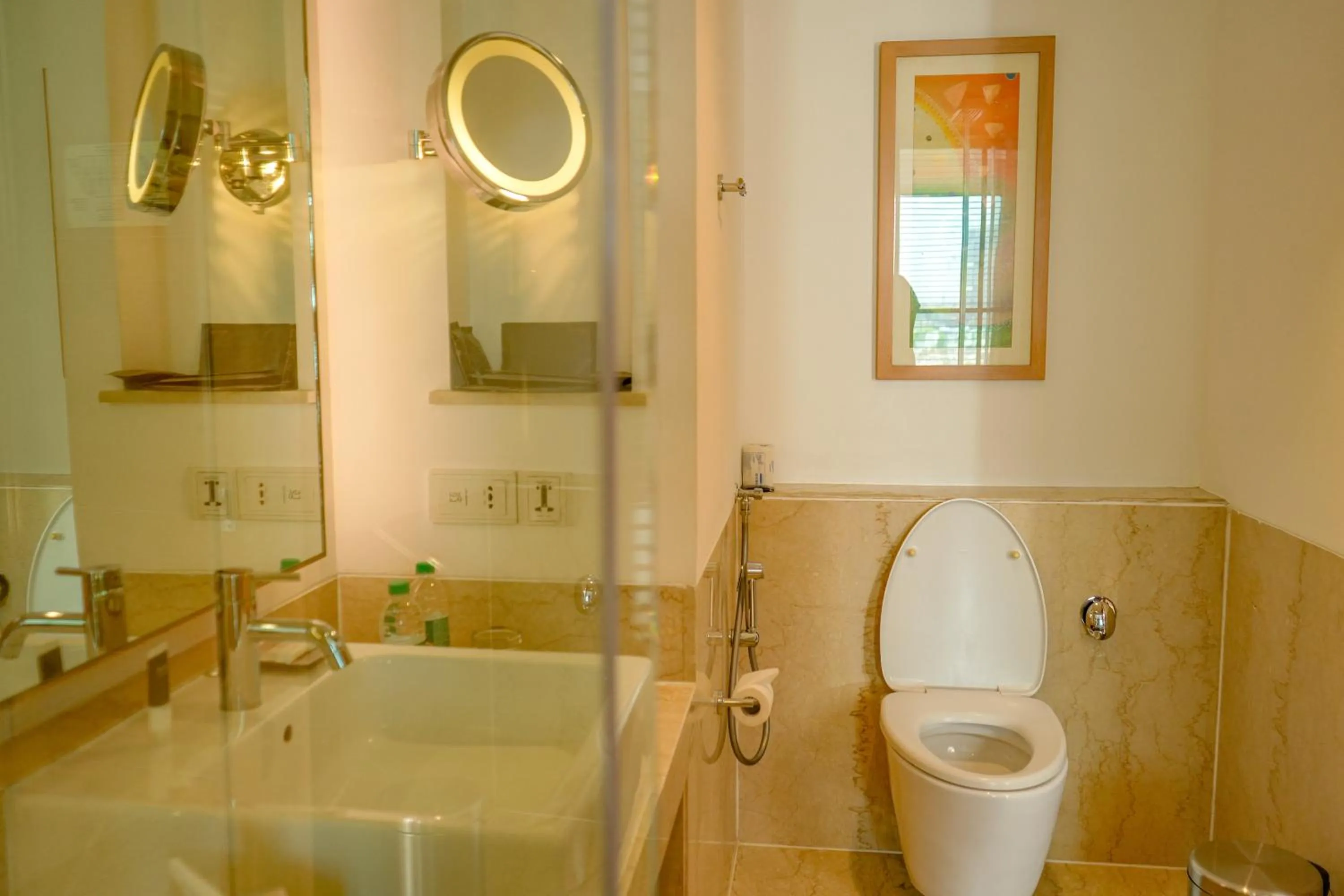 Toilet in Courtyard by Marriott Gurugram Downtown