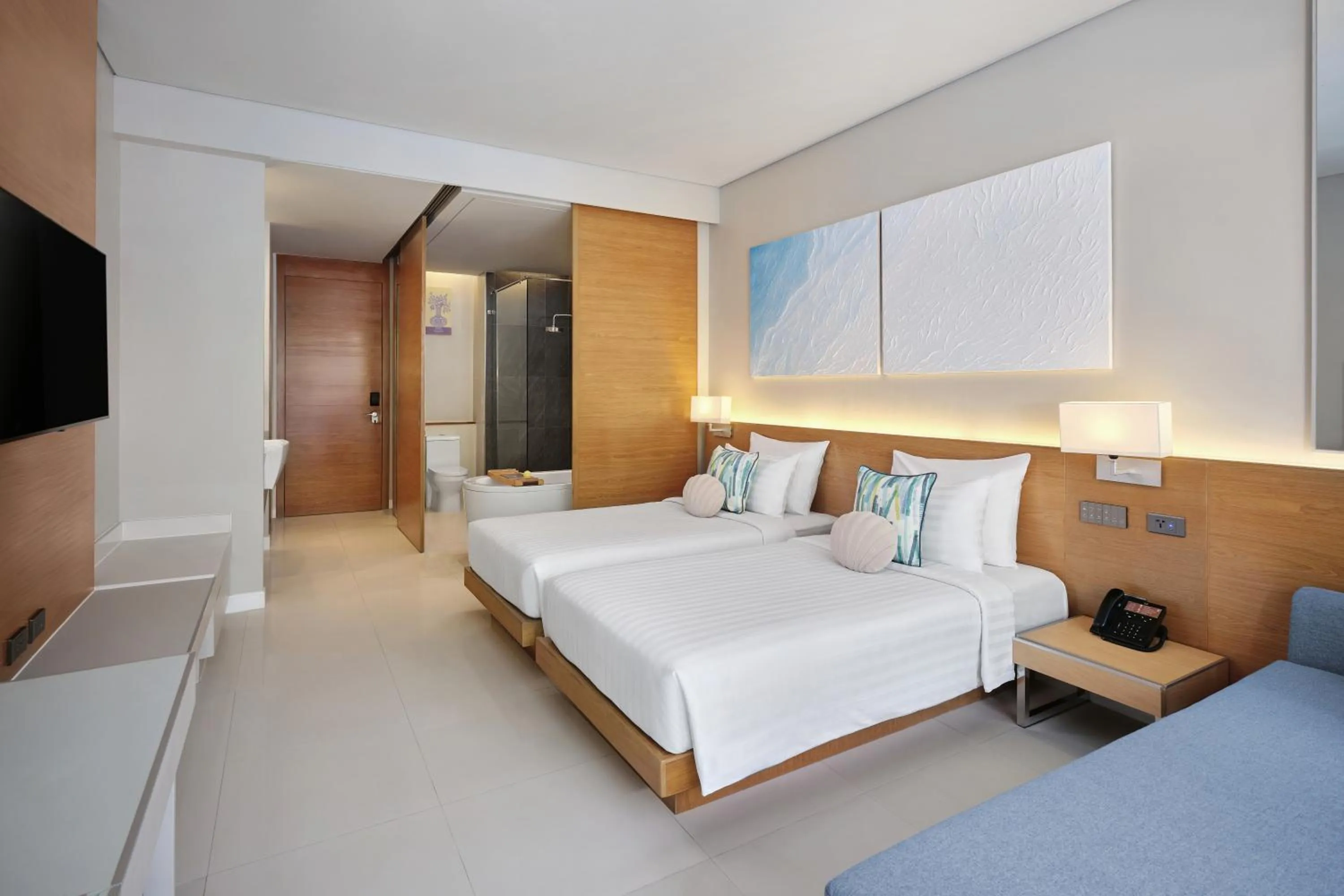 Bed in The Kee Resort & Spa