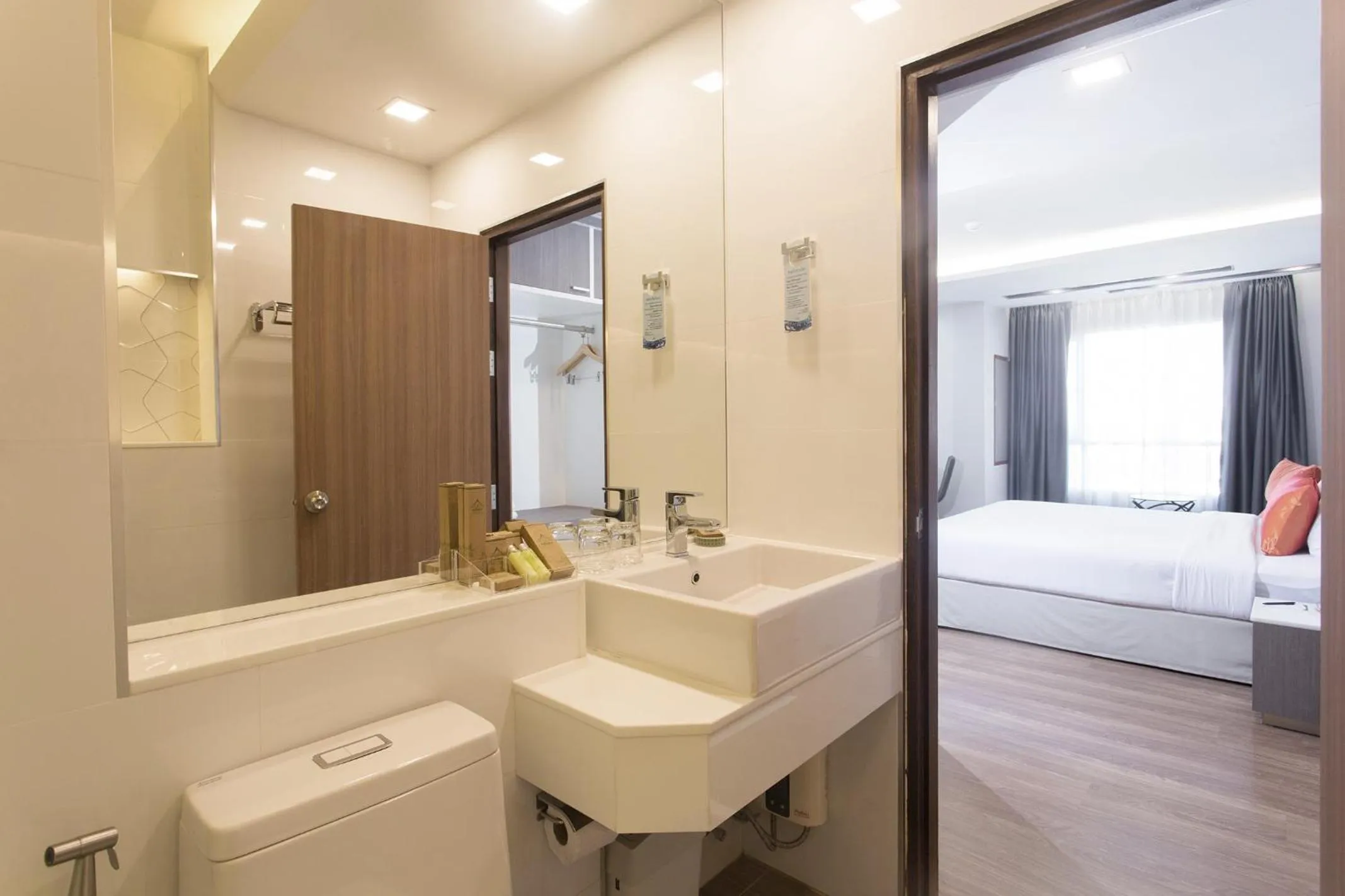 Shower, Bed in Khum Phucome Hotel -SHA Extra Plus