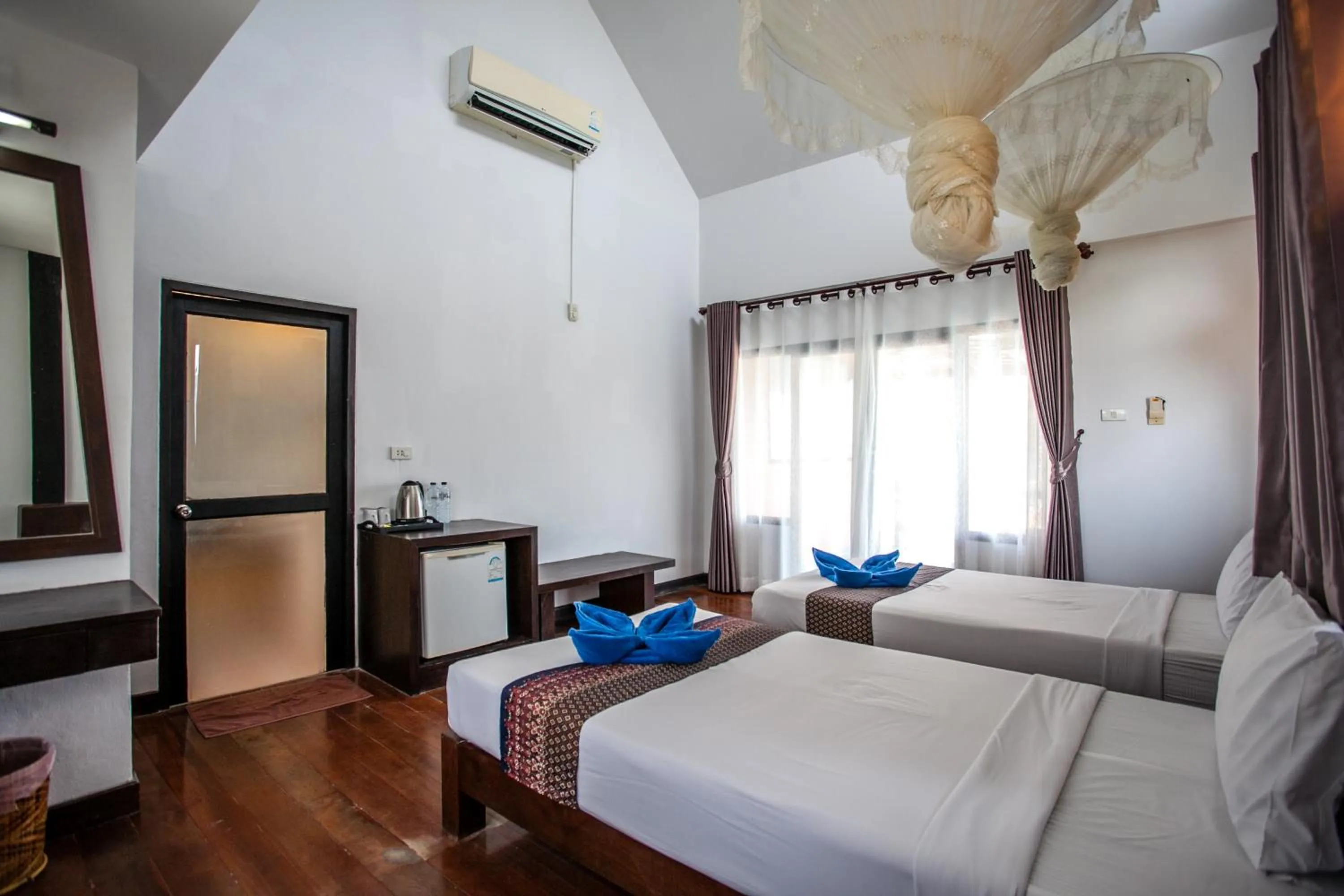 Bed in Phitharom PP Resort