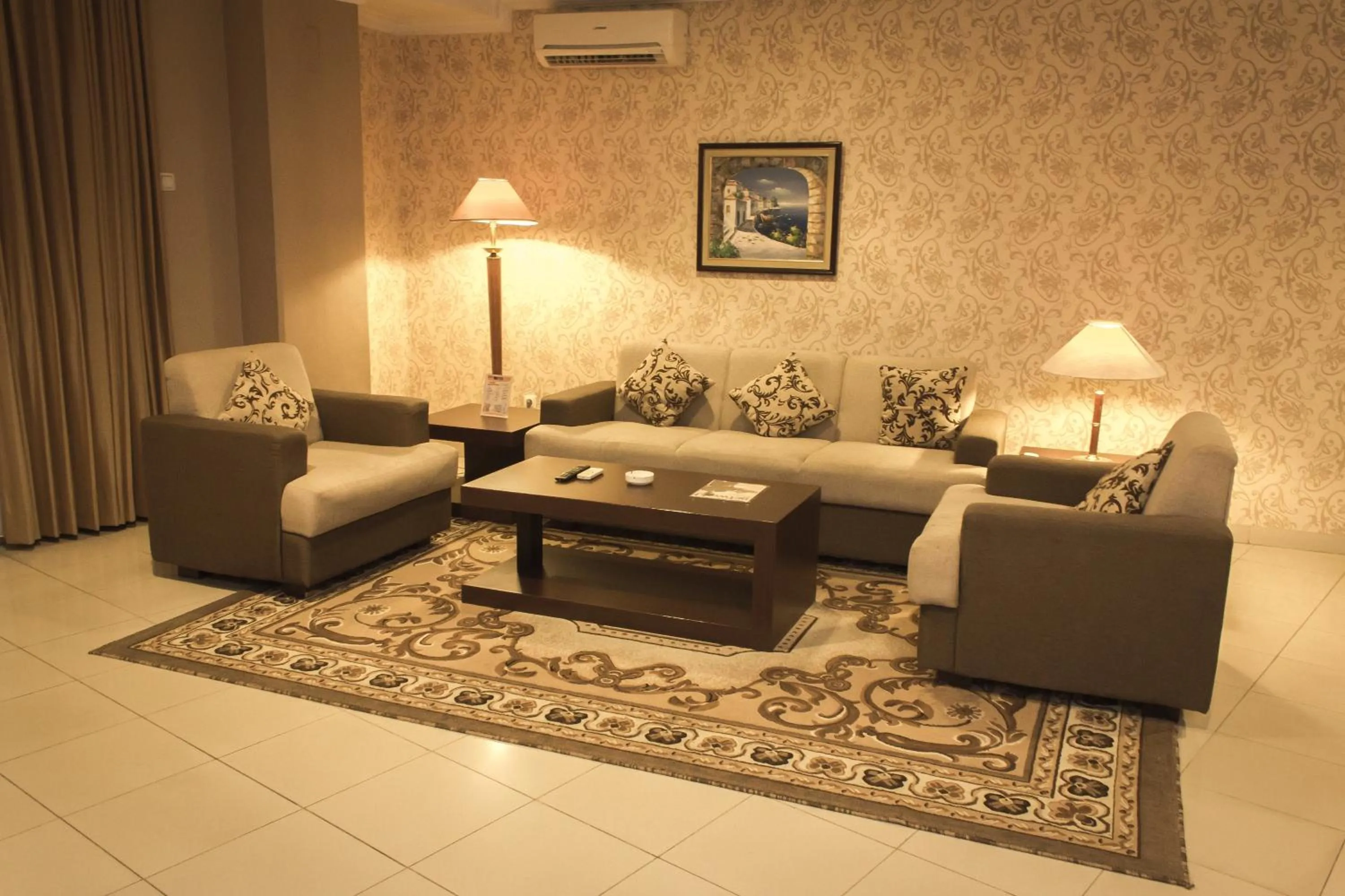 Living room in Travellers Suites Serviced Apartments