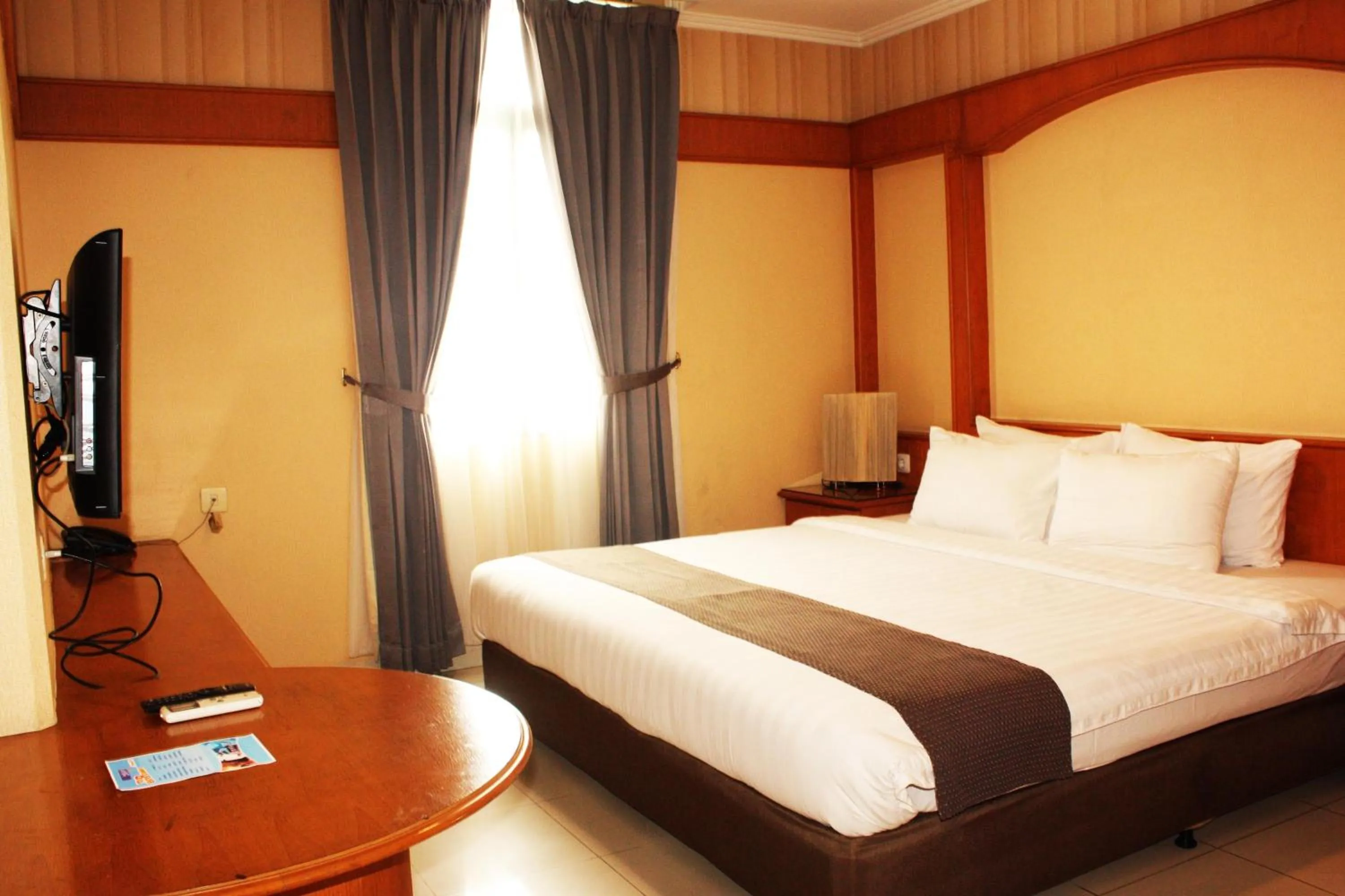 Bedroom, Bed in Travellers Suites Serviced Apartments