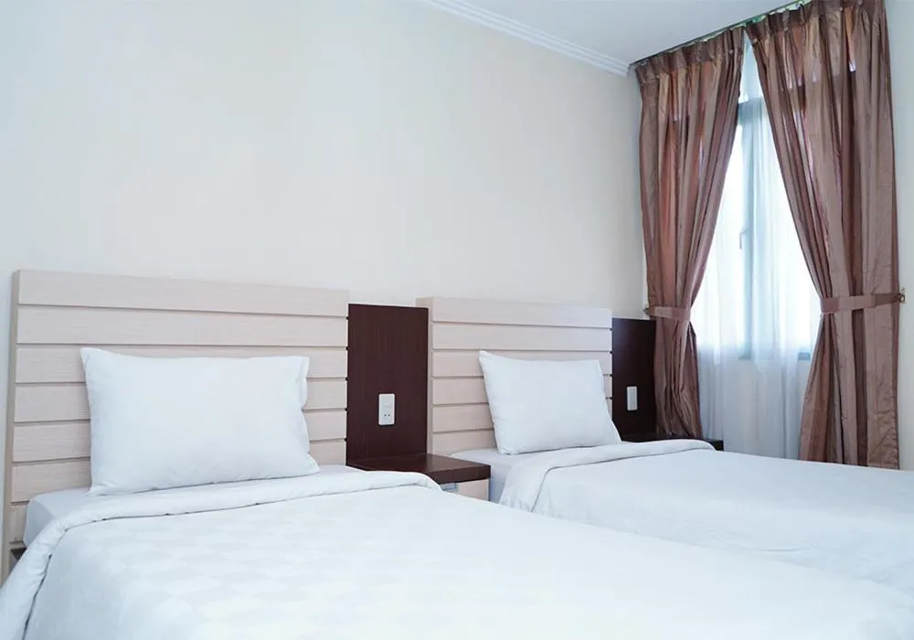 Bedroom, Bed in Travellers Suites Serviced Apartments