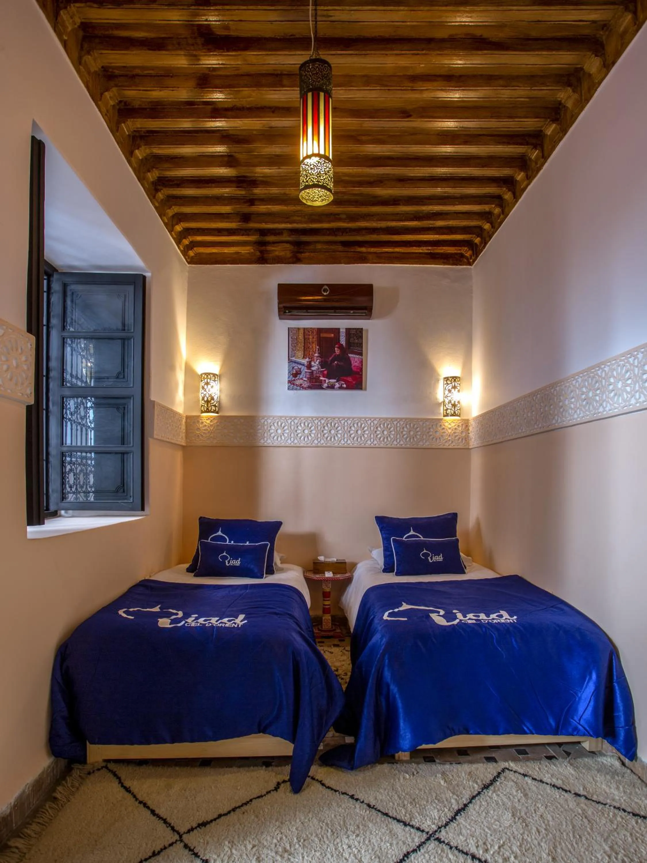 Bed in Riad Ciel d'Orient