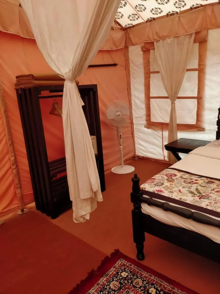 Bed in Dhora Desert Resort And Spa