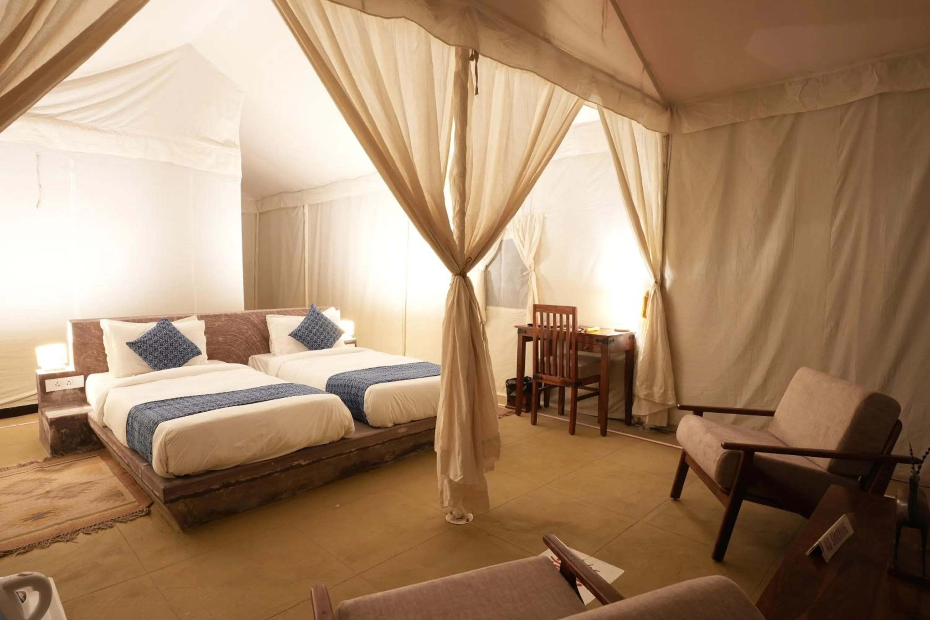 Bed in Dhora Desert Resort And Spa