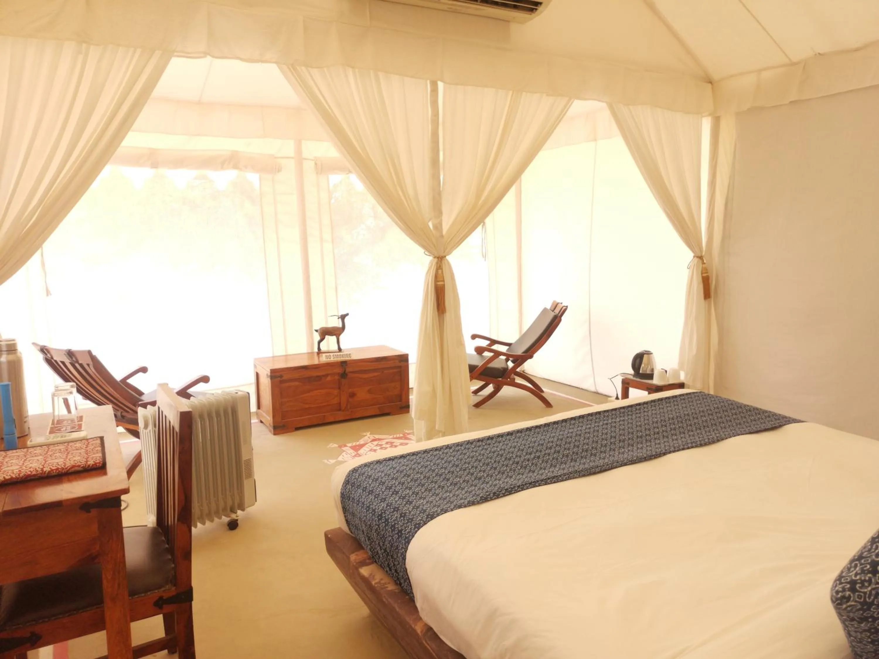 Bed in Dhora Desert Resort And Spa