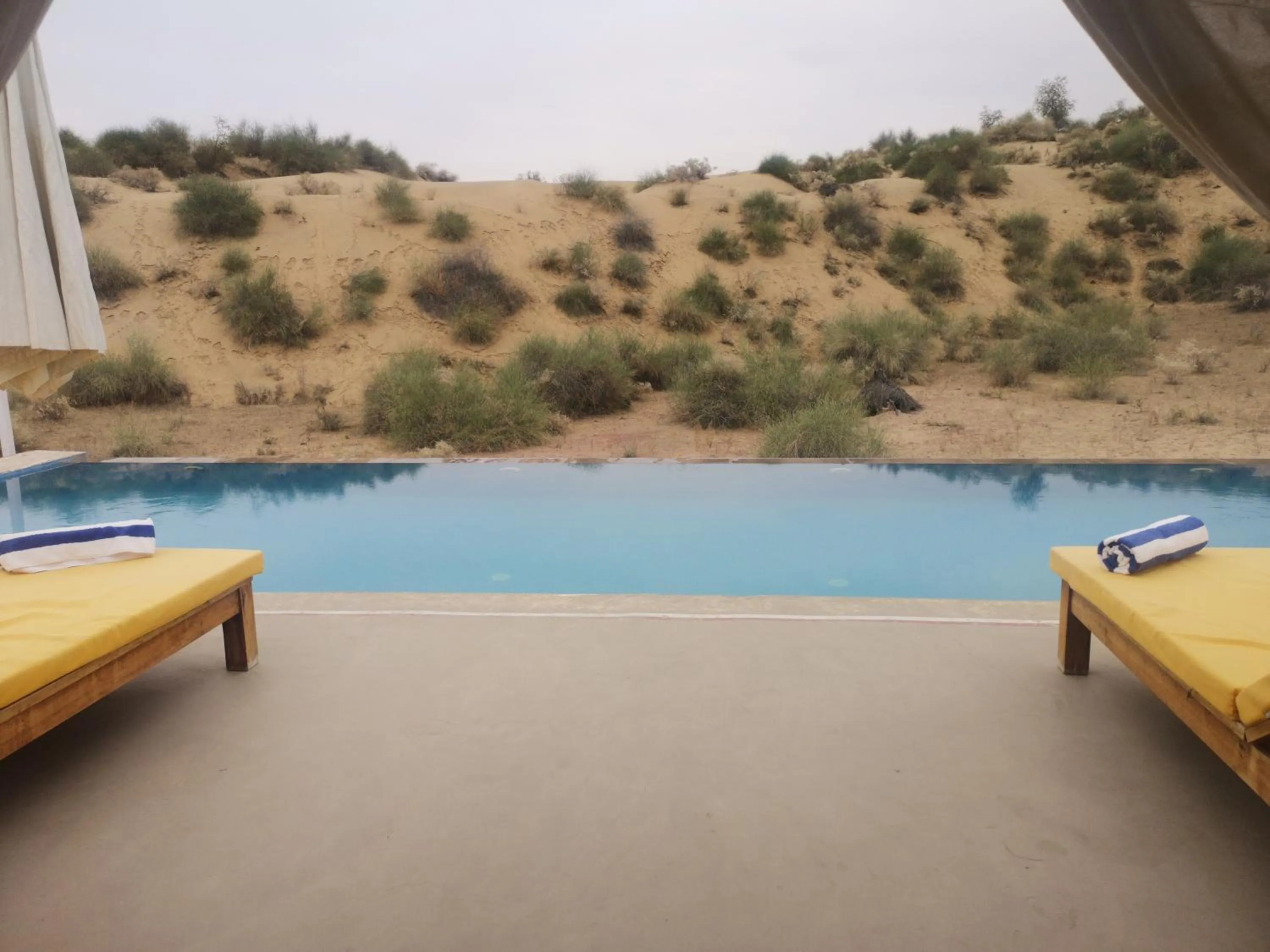 Swimming pool in Dhora Desert Resort And Spa