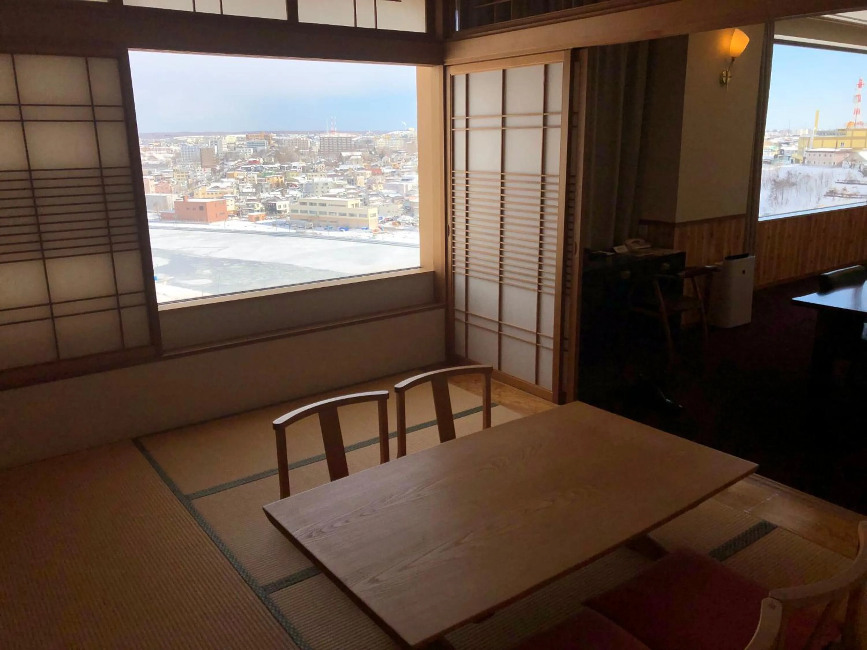 Living room, Bed in La Vista Kushirogawa Hotel Natural Hot Spring