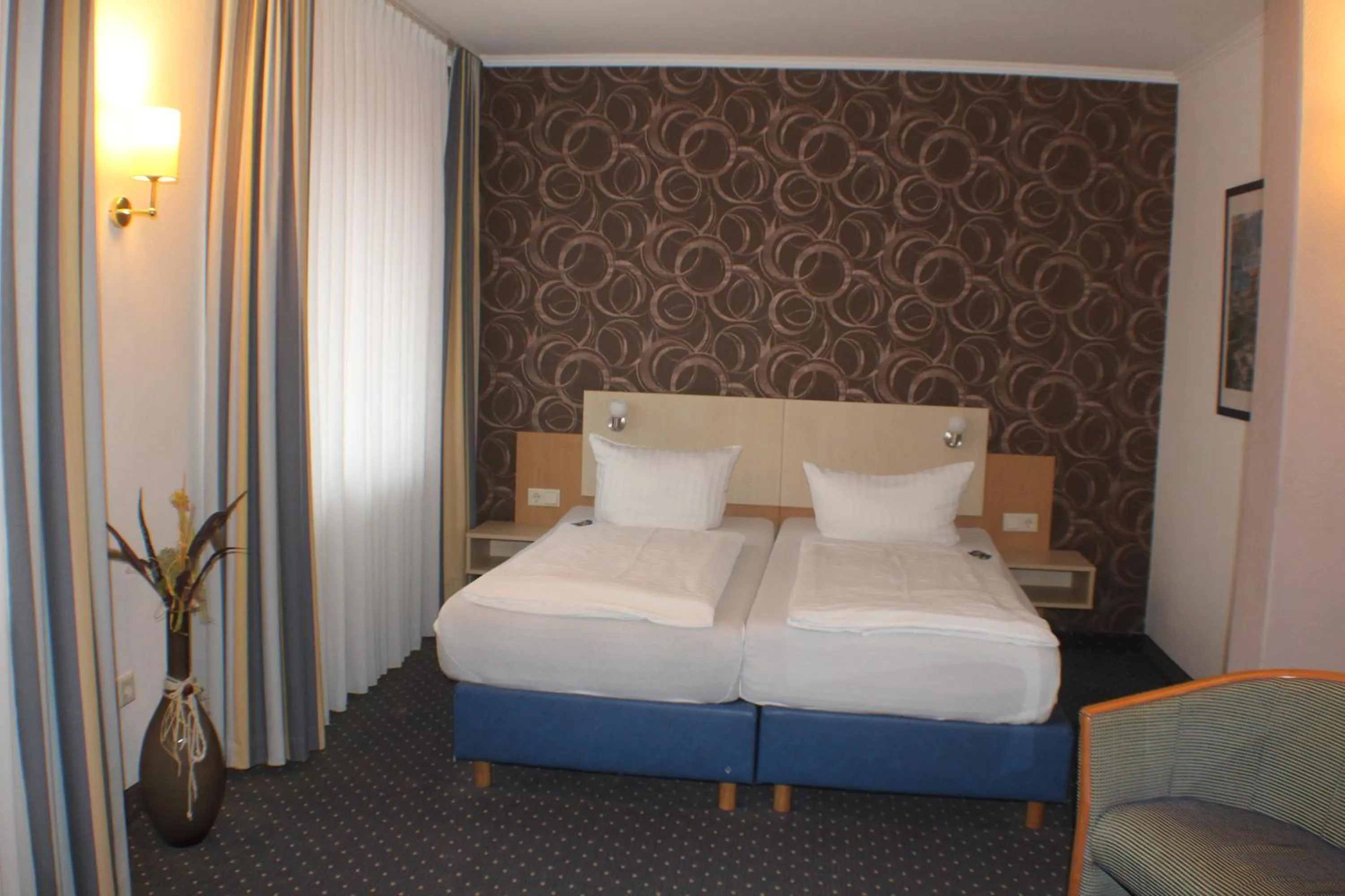 Bed in WH Hotels Papenburg Zentrum