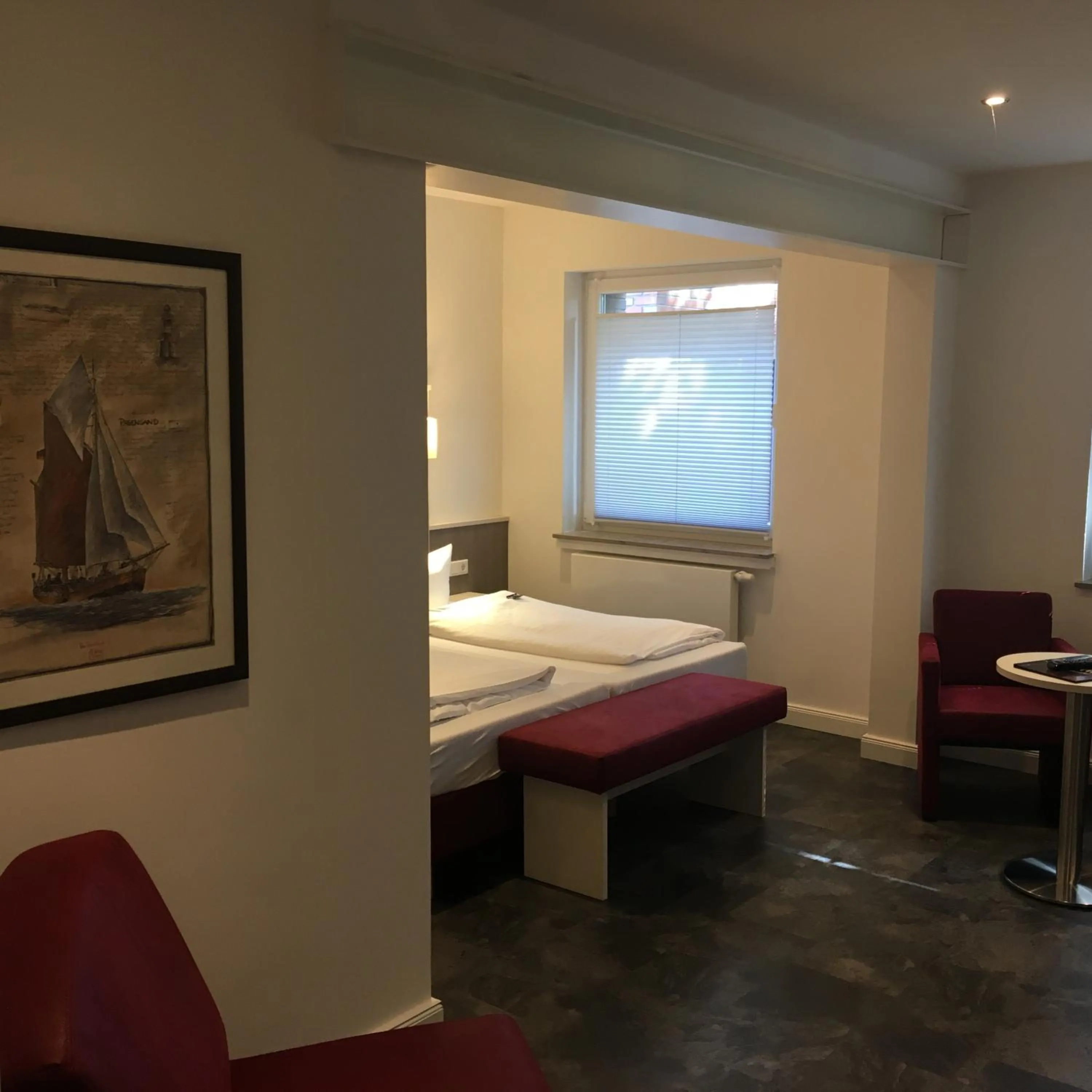 Photo of the whole room, Bed in WH Hotels Papenburg Zentrum