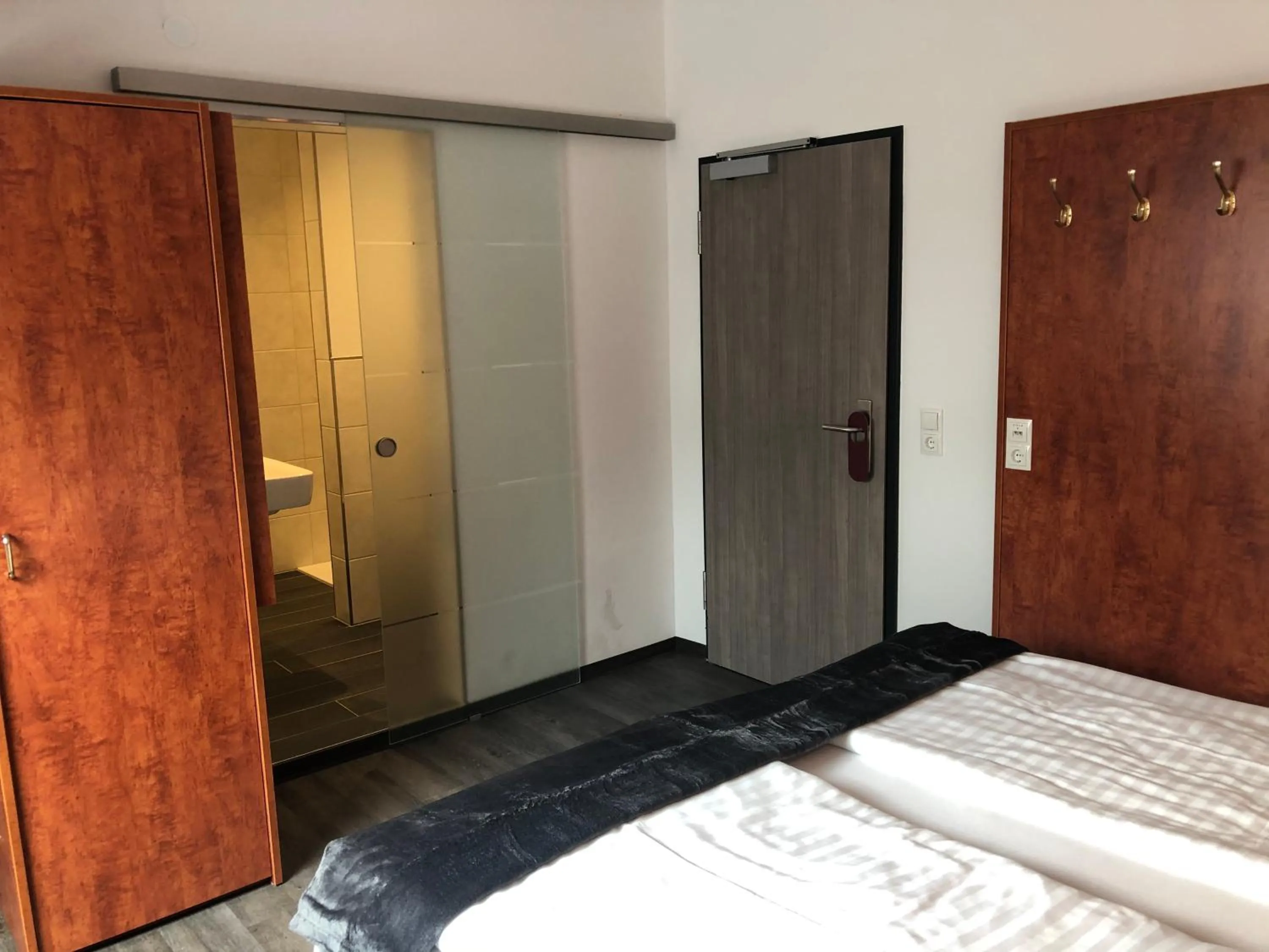 Photo of the whole room, Bed in WH Hotels Papenburg Zentrum