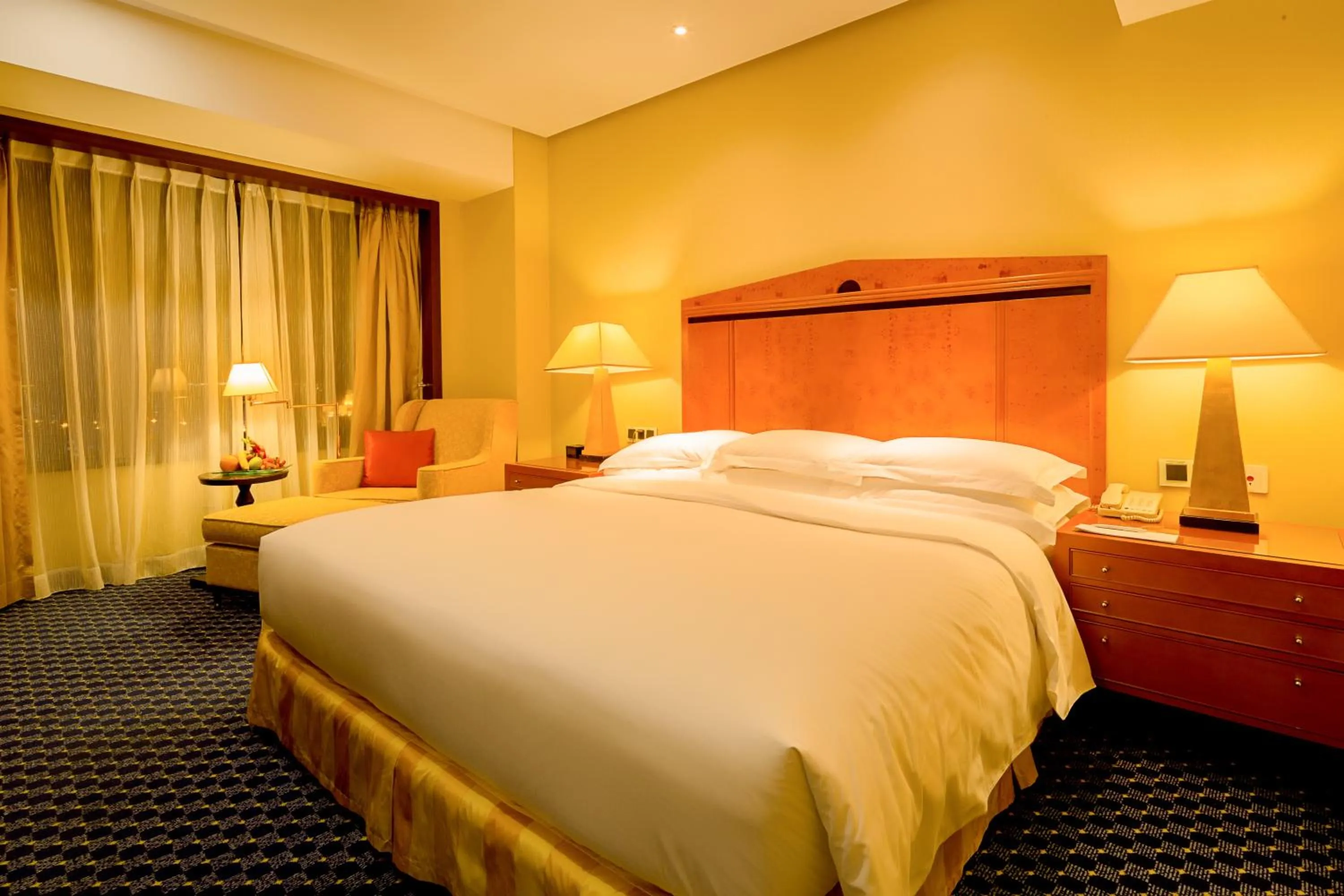 Bed in Renaissance Tianjin TEDA Convention Centre Hotel