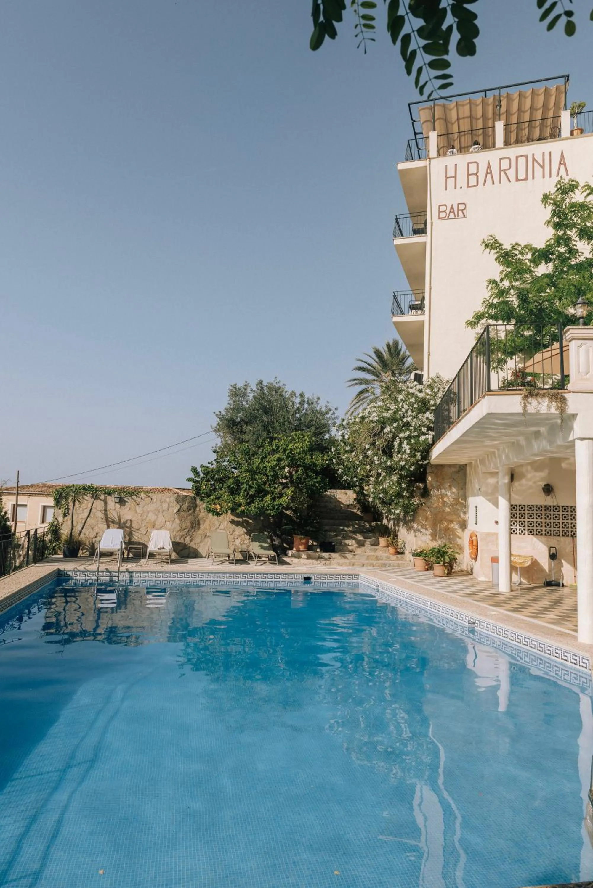 Swimming pool in Hostal Sa Baronia