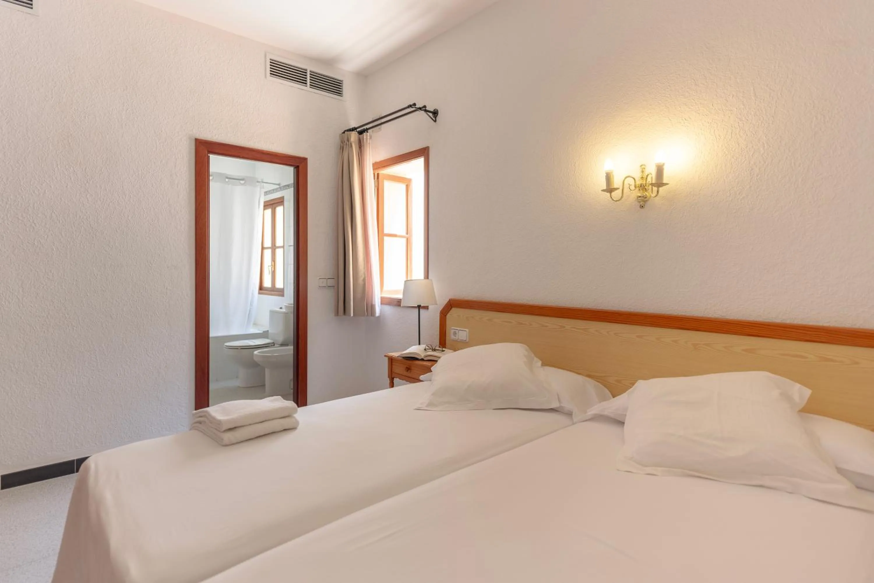 Photo of the whole room, Bed in Hostal Sa Baronia