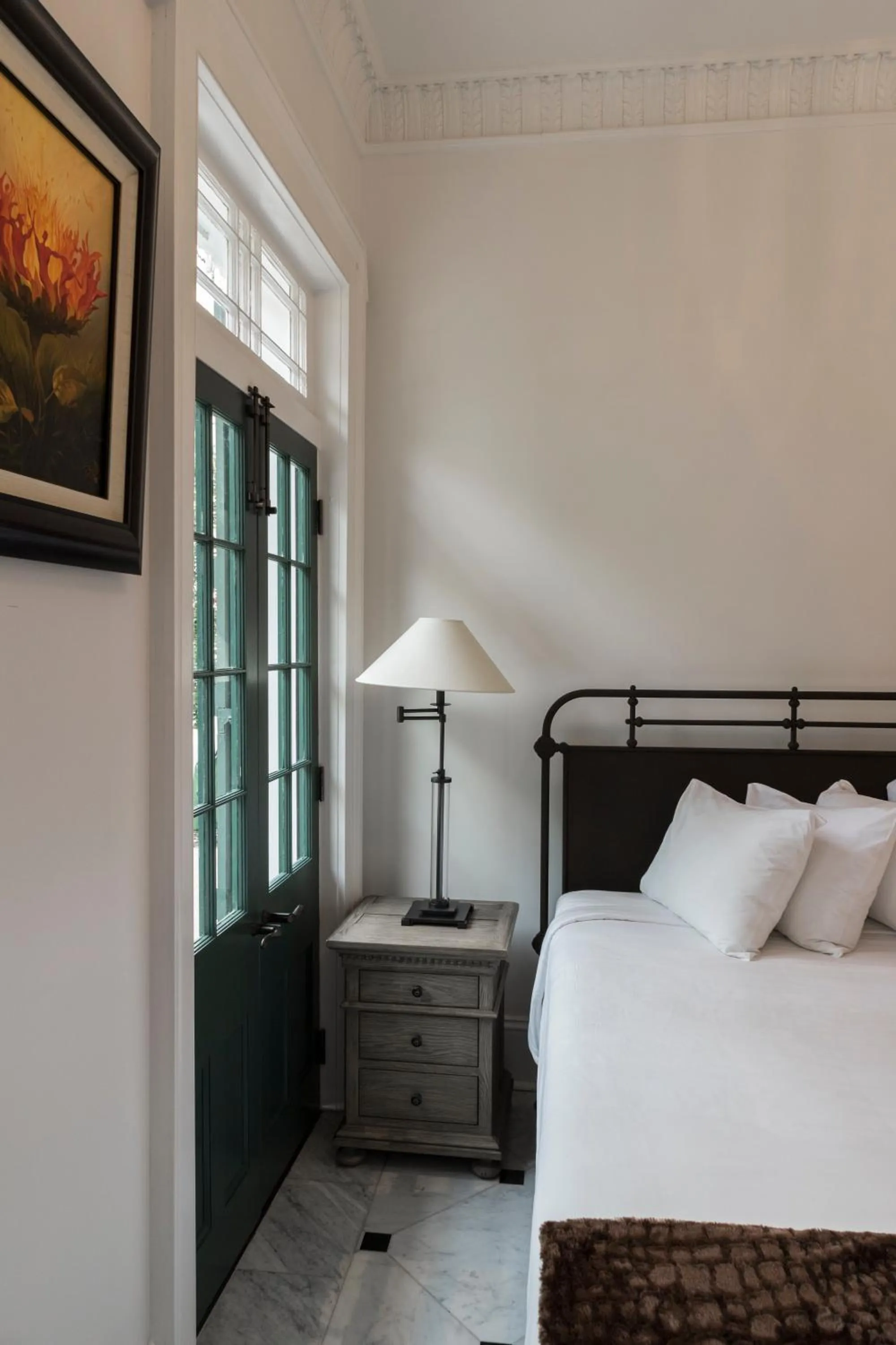 Bed in Royal Frenchmen Hotel and Bar