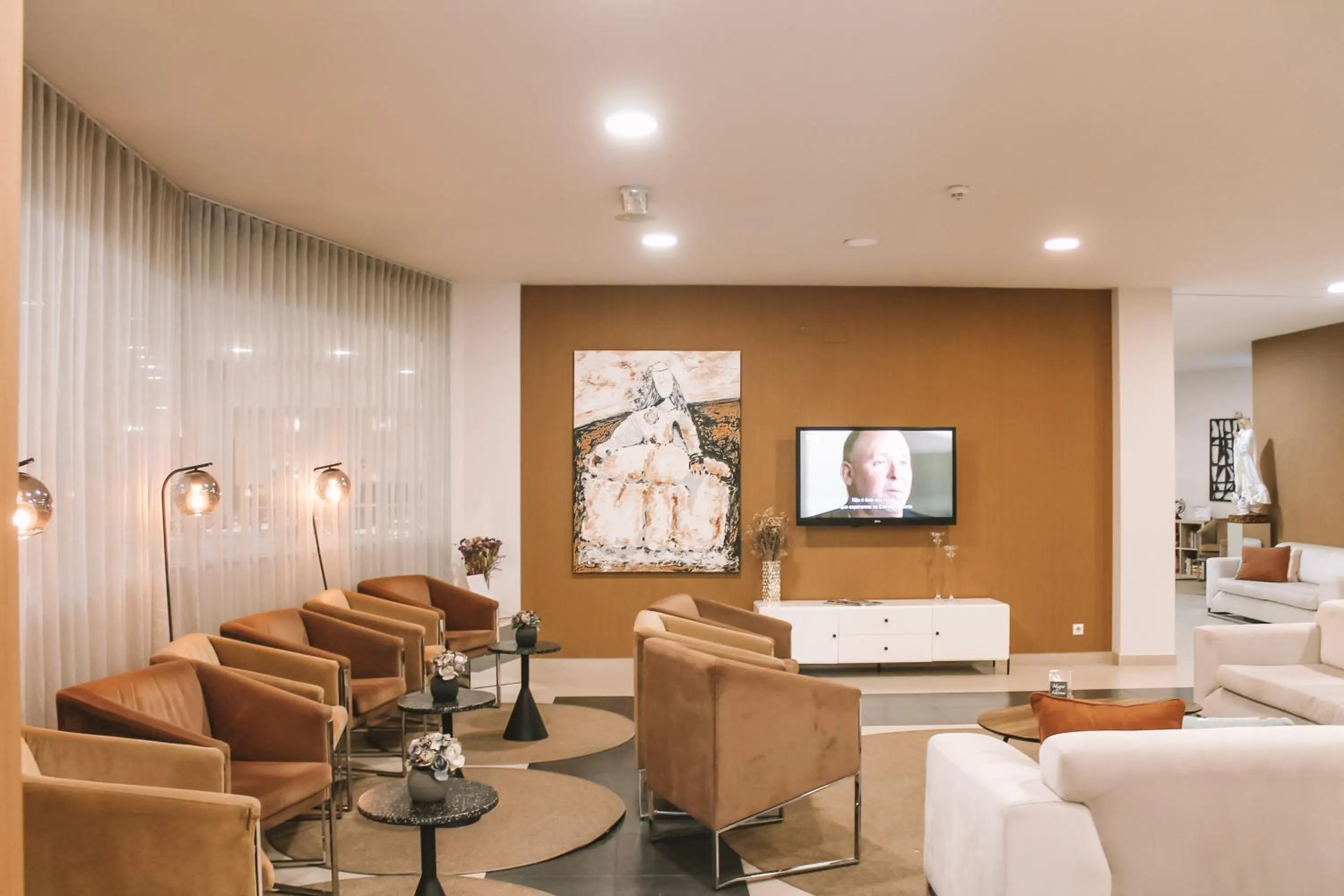 Lobby or reception in Vitoria Hotel