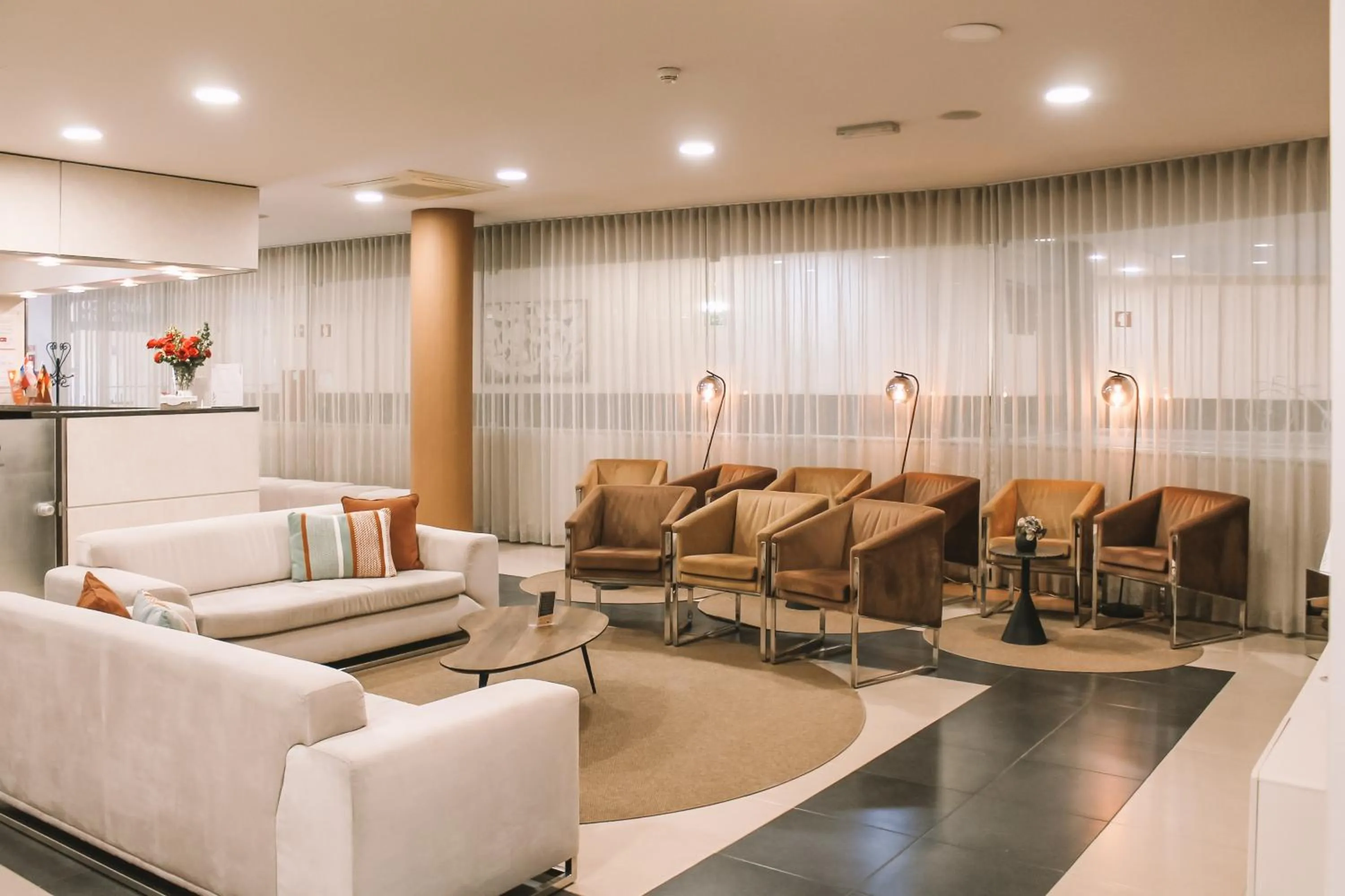 Lobby or reception in Vitoria Hotel