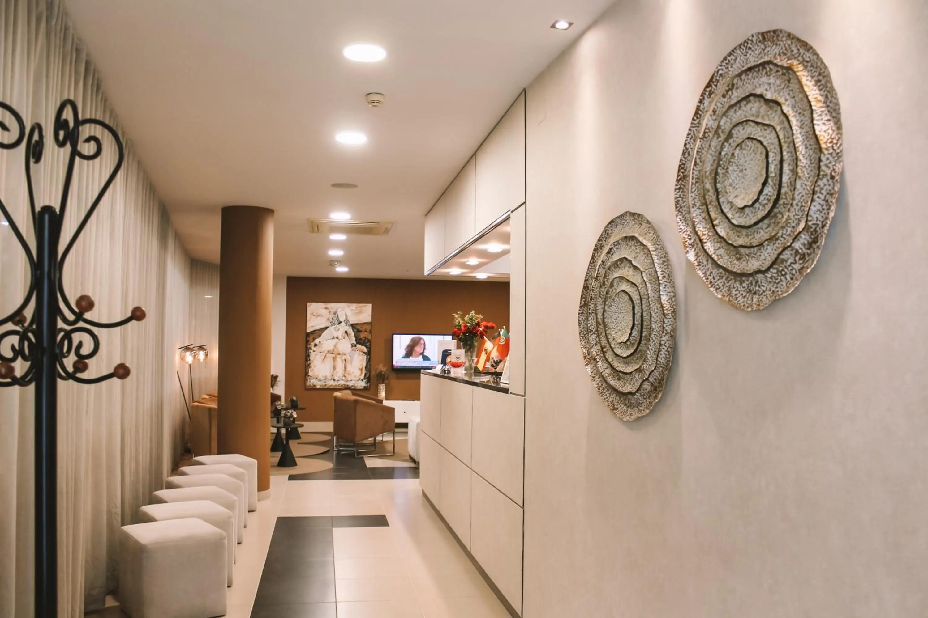 Lobby or reception in Vitoria Hotel