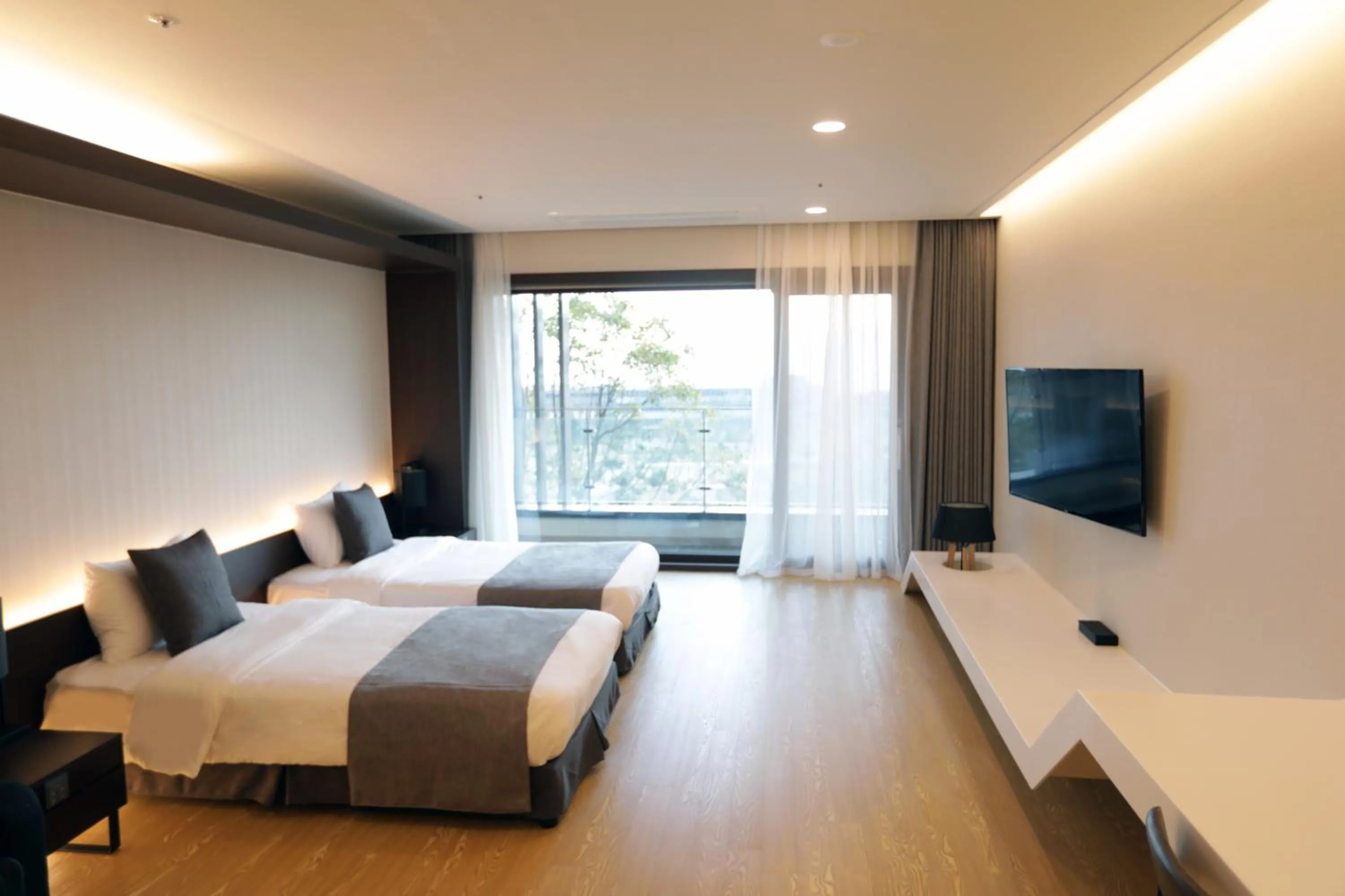 Bed in The Qube Resort Jeju