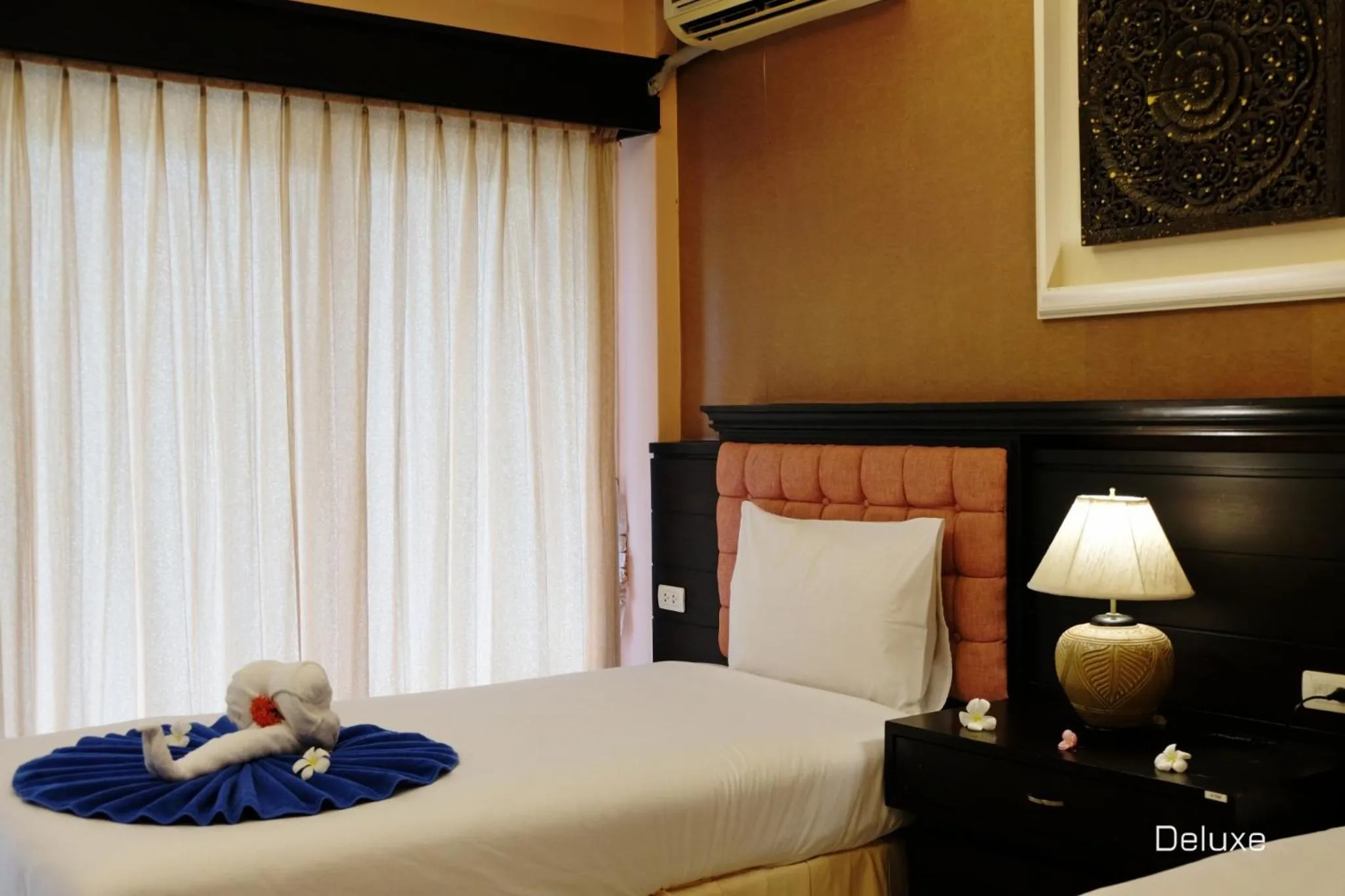 Bed in Andaman Lanta Resort - SHA Extra Plus