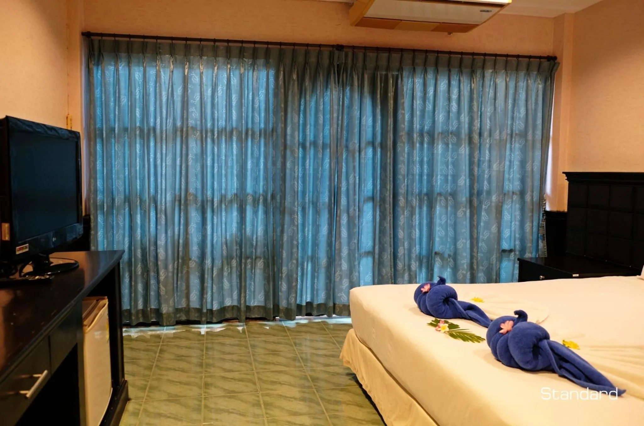 Bed in Andaman Lanta Resort - SHA Extra Plus