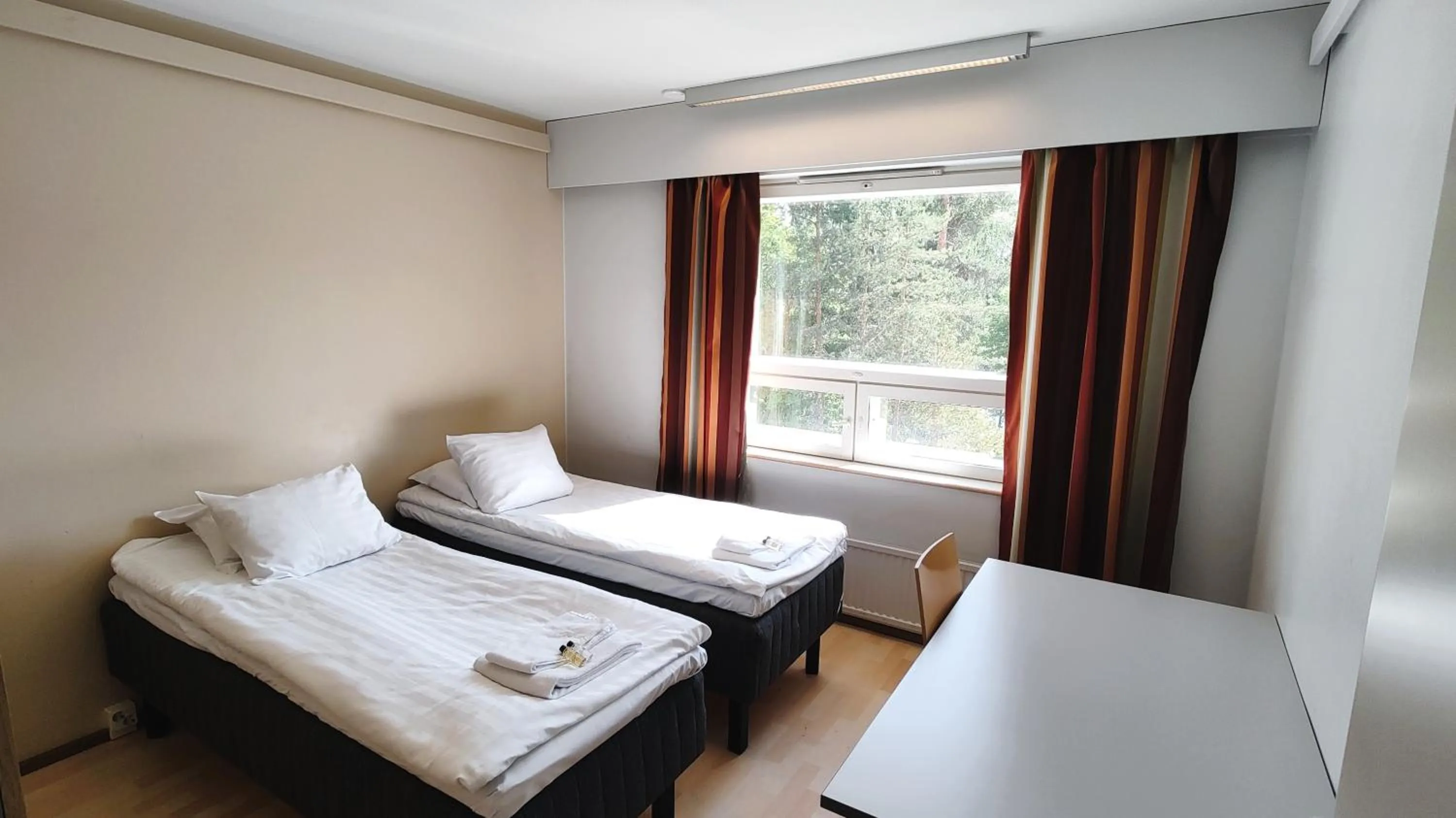 Bed in Summer Hotel Vuorilinna