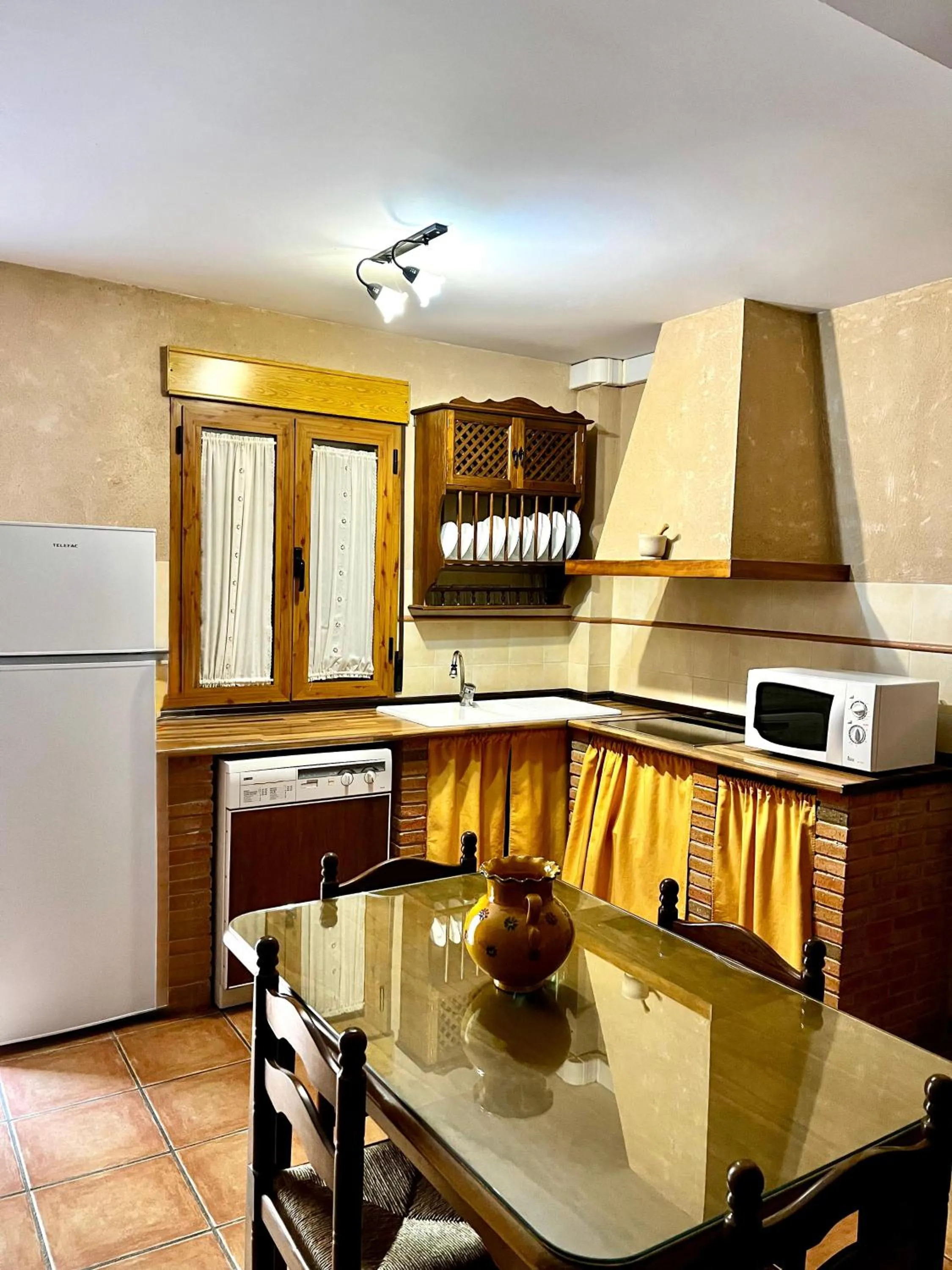 Kitchen or kitchenette in Apartamentos Valle del Guadalquivir