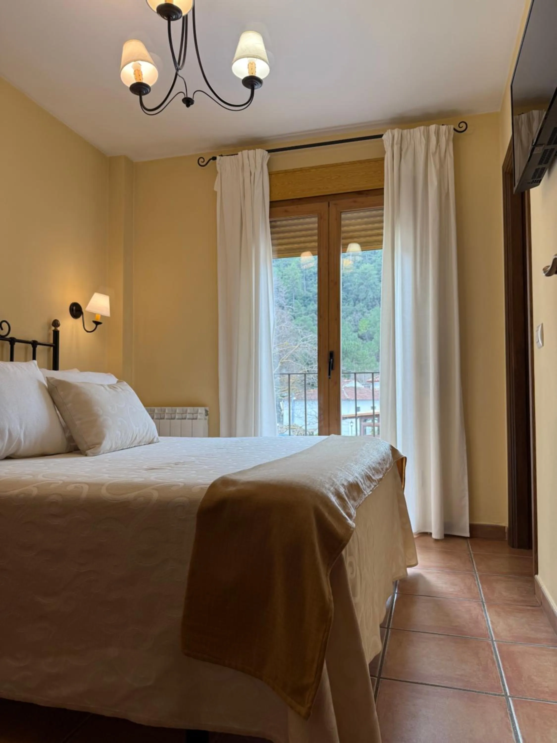 Bed in Apartamentos Valle del Guadalquivir