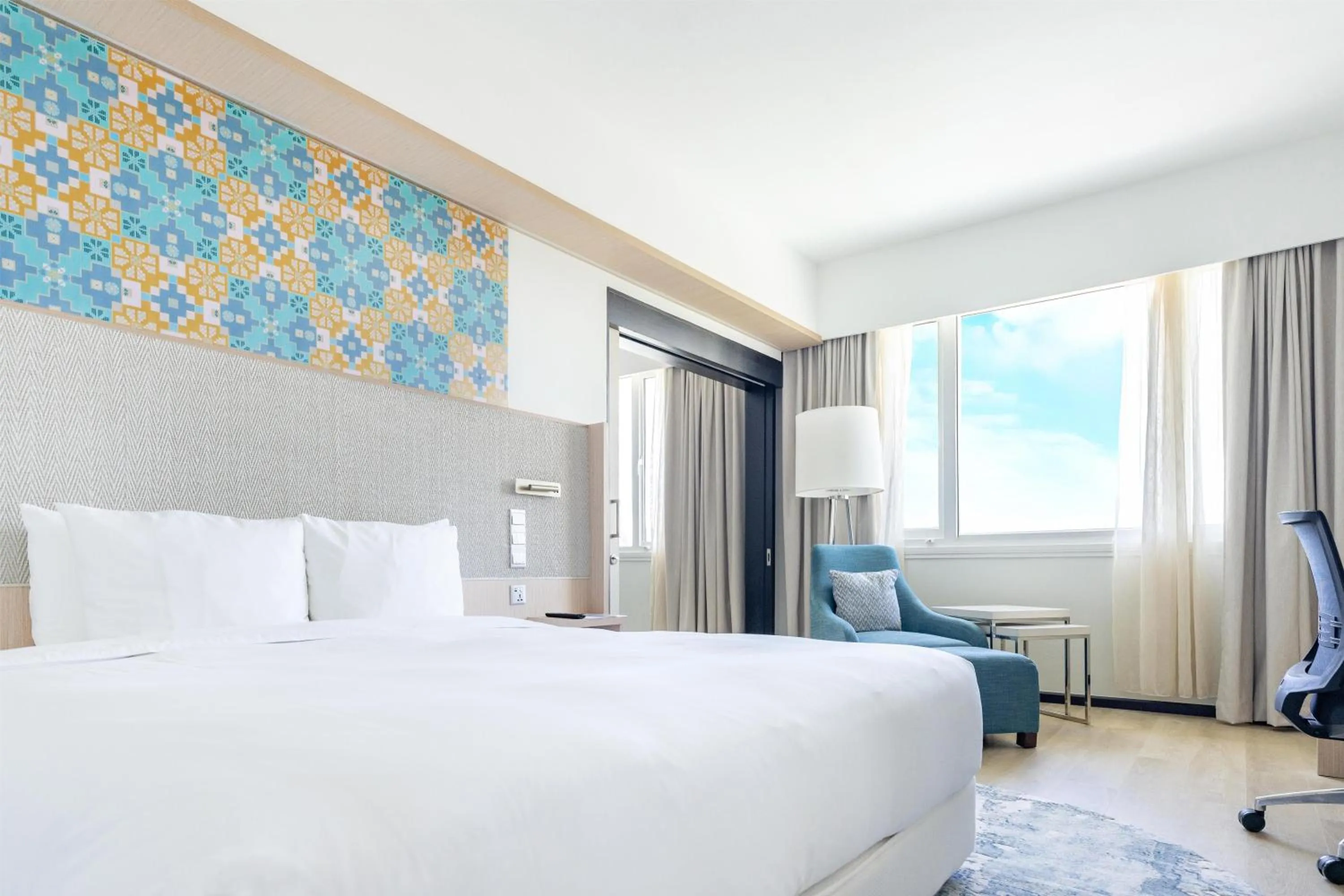 Photo of the whole room, Bed in Radisson Hotel Brunei Darussalam