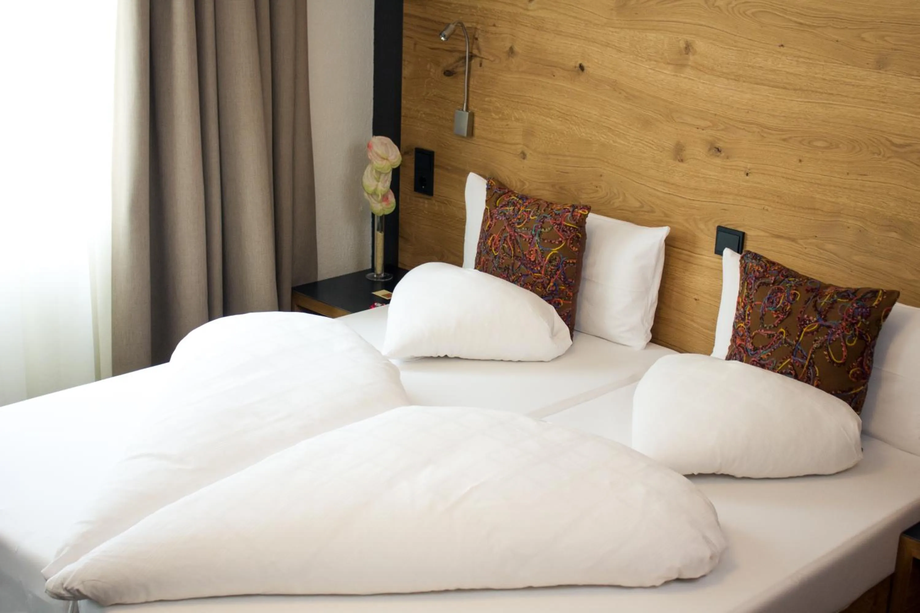 Bed in Hotel Montfort