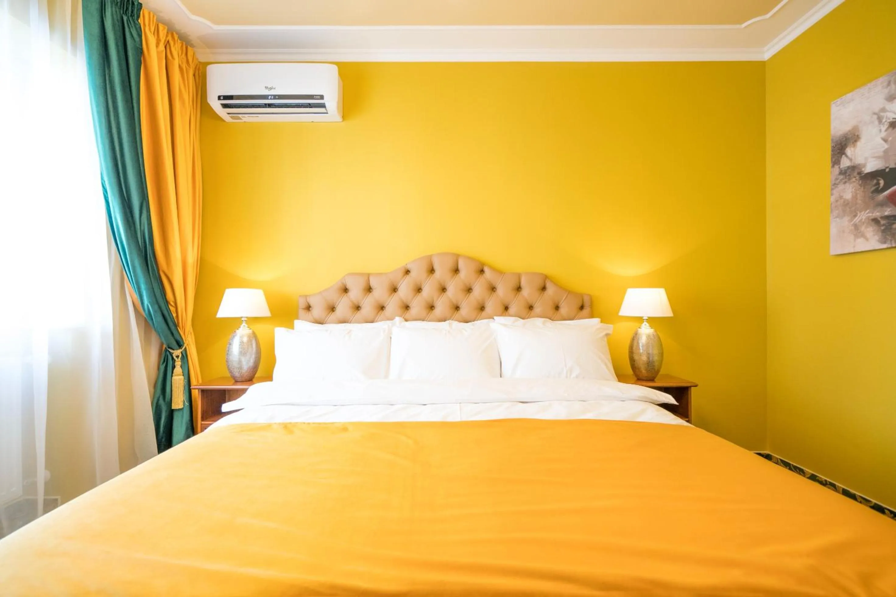 Bed in Studio One Accommodation Suites