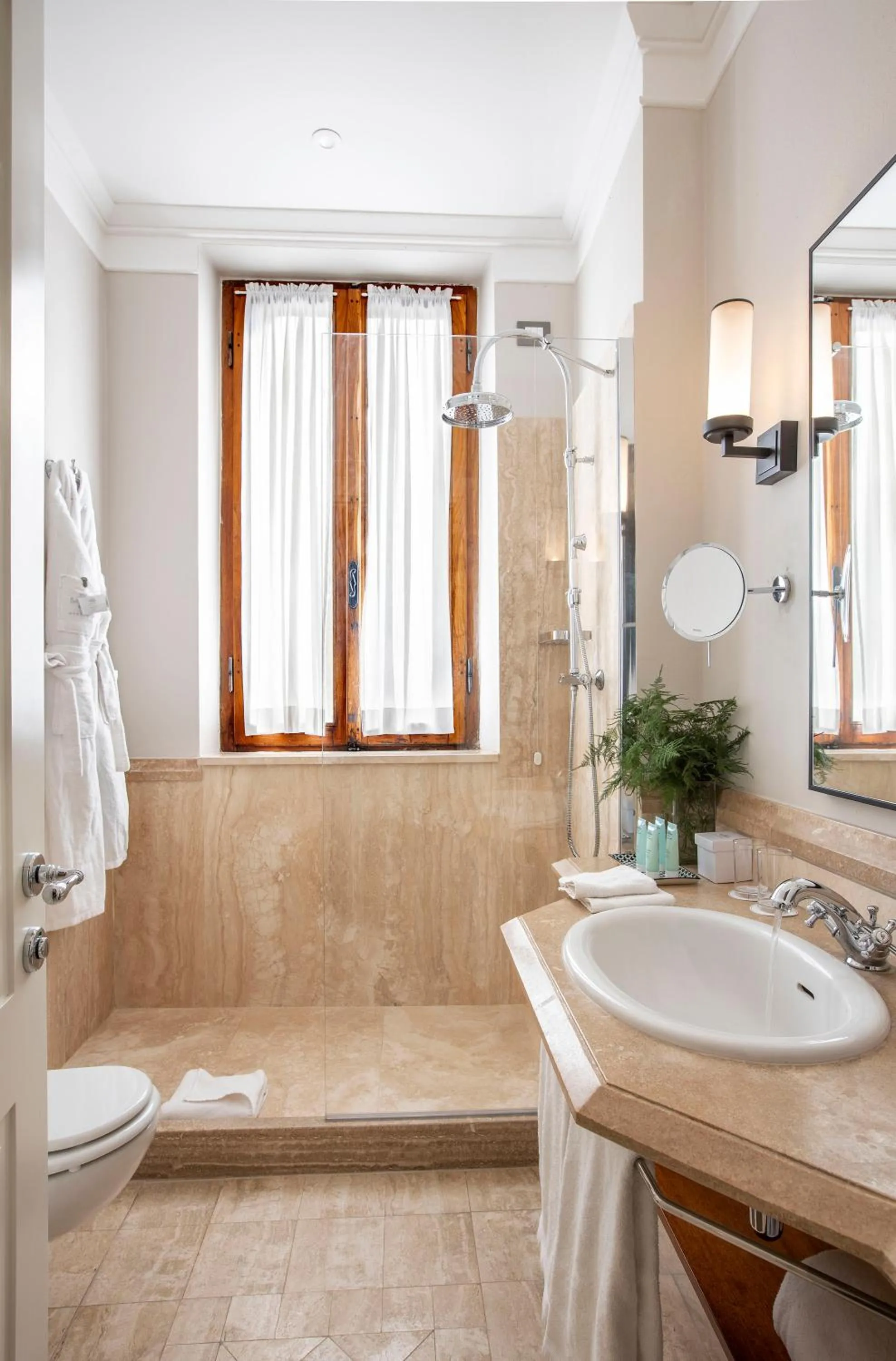 Shower in Terme di Saturnia Natural Spa & Golf Resort - The Leading Hotels of the World