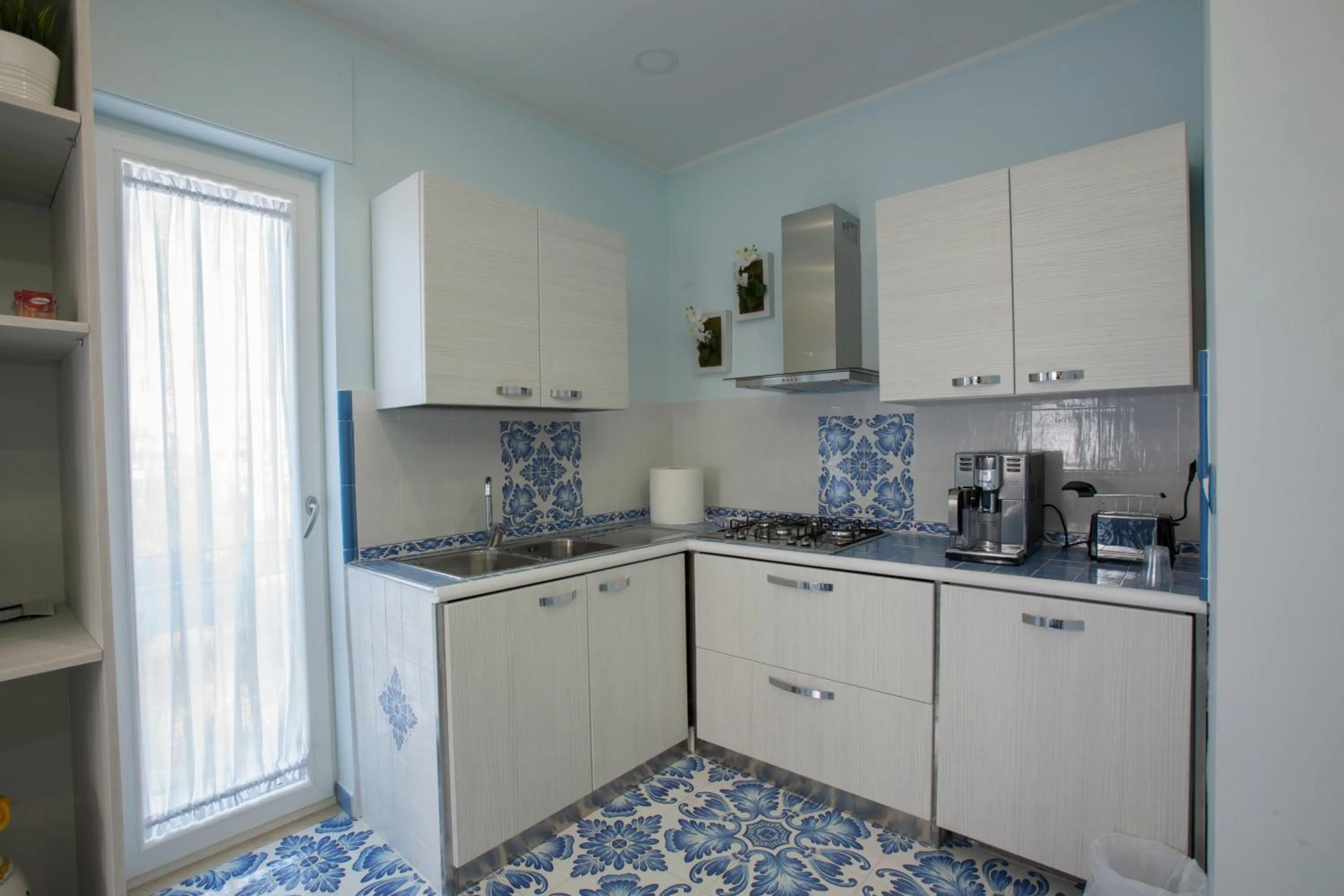 Communal lounge/ TV room in Golfo Delle Sirene