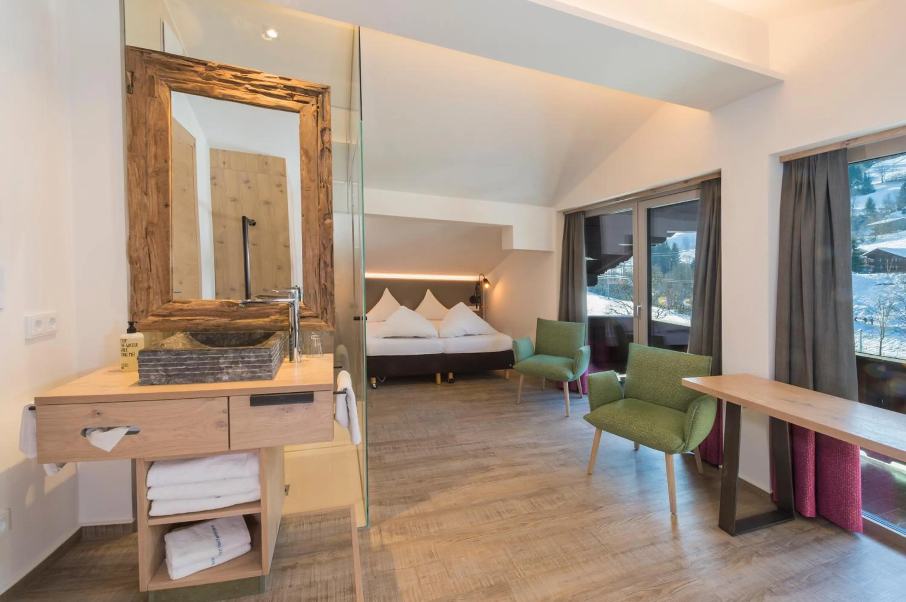 Bathroom, Bed in Lifesport Hotel Hechenmoos